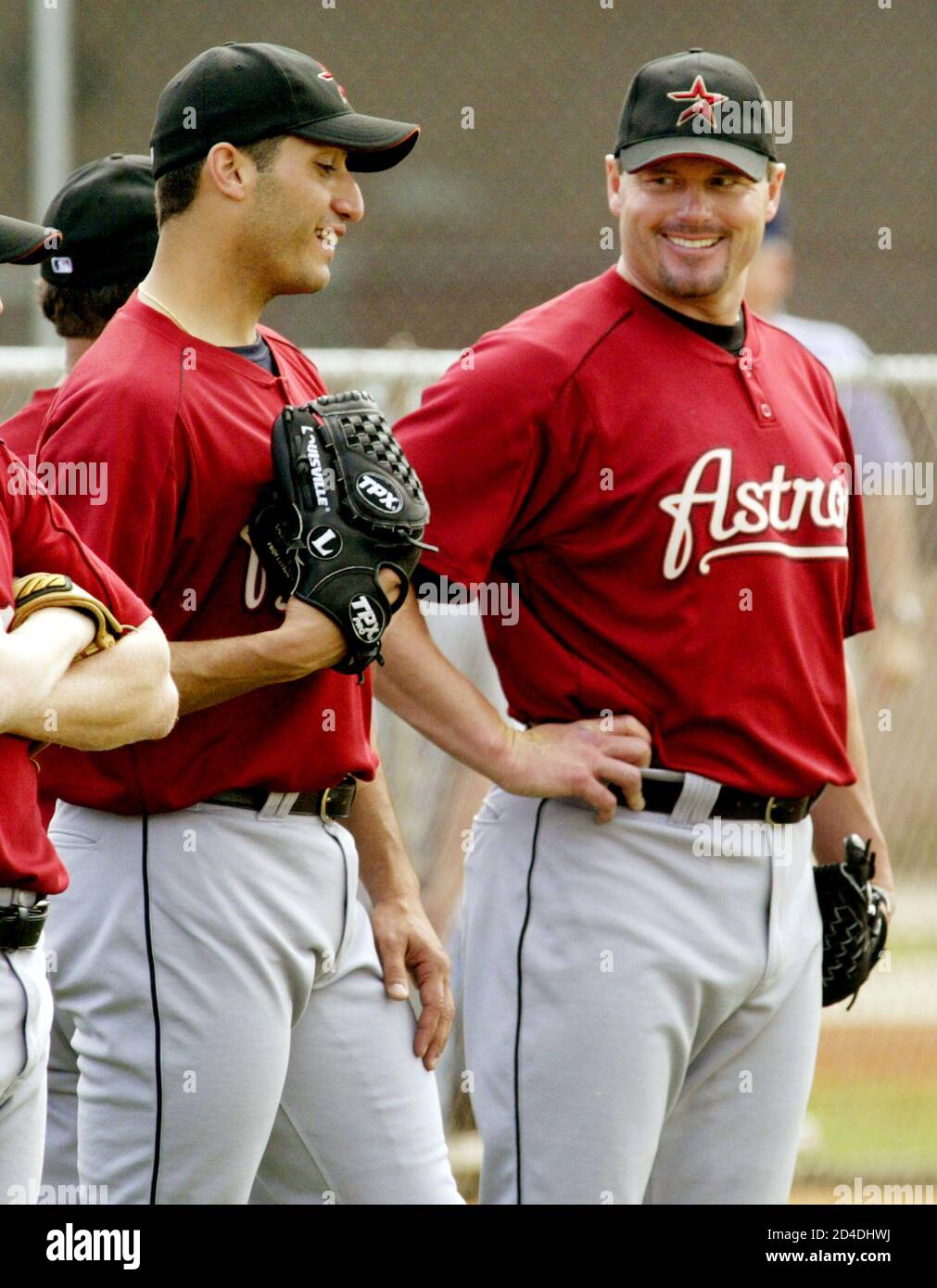 Houston Astros Pitchers Andy Pettitte L And Roger Clemens Watch Drills As They Wait Their Turns During Workouts At Their Spring Training Camp In Kissimmee Florida March 2 2004 Both Pitchers Came