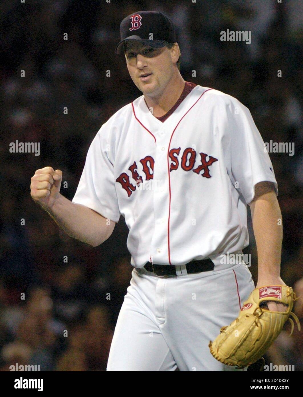 Boston Red Sox Pitcher Derek Lowe pumps his fist in the sixth inning  against the Los Angeles Dodgers at Fenway Park in Boston, Massachusetts June  11, 2004. Lowe pitched seven scoreless innings