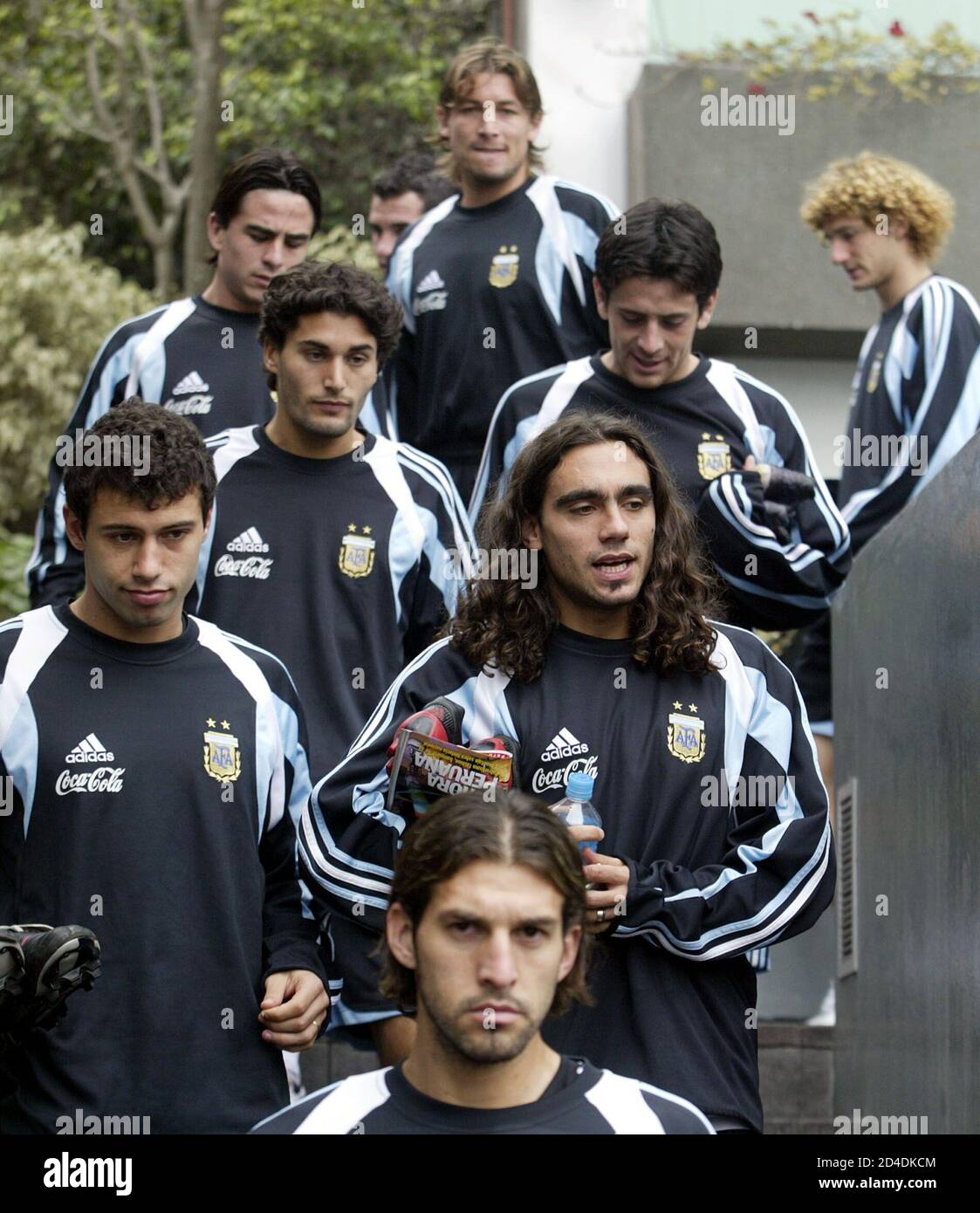 Argentina's players Facundo Quiroga (C, below), (L-R, front row) Javier  Mascherano, Juan Pablo Sorin, (L-R, middle row) Nicolas Medina, Leandro  Fernandez, (L-R, top row) Mauro Rosales, Gabriel Heinze and Fabricio  Coloccini leave