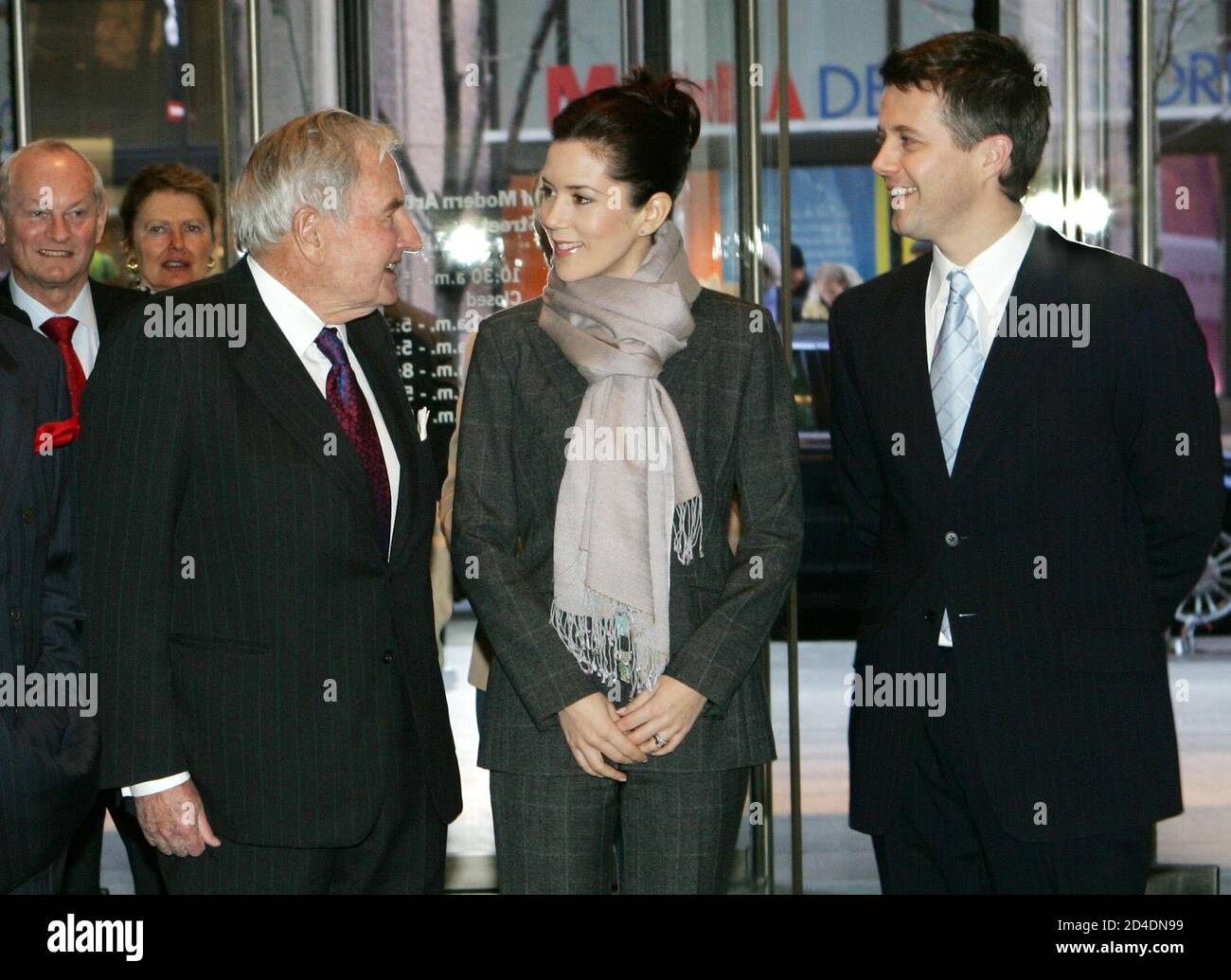 Denmark's Crown Prince Frederick (R) and his wife Crown Princess Mary are greeted by David Rockefeller, (L) the Chairman Emeritus New York's Museum of Modern Art as the Royal couple arrived at the Museum for a private tour, January 31, 2005. REUTERS/Mike Segar MS Stock Photo