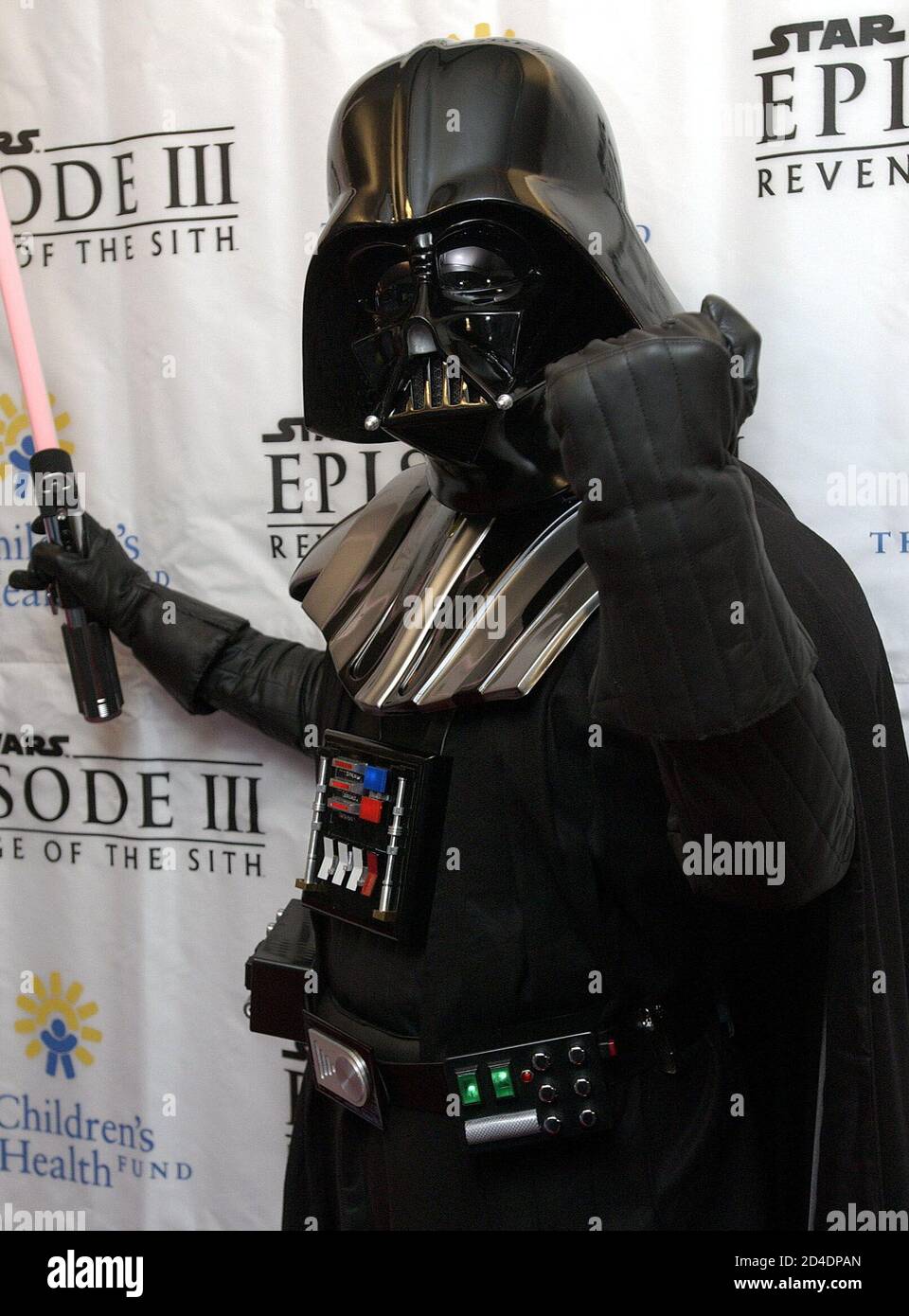 A fan dressed as Darth Vader poses at the premiere of Star Wars Episode III, Revenge of the Sith in New York, May 12, 2005.  The movie opens nationwide May 19. Stock Photo
