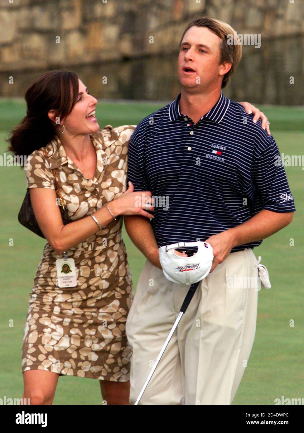 David Toms is greeted by his wife Sonya on the 18th green after he won the  83rd PGA Championship August 19, 2001 at the Atlanta Athletic Club in  Duluth, Georgia. Toms won