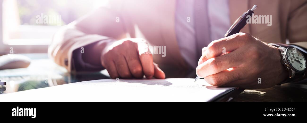 African American Writing Contract Form Close Up Stock Photo
