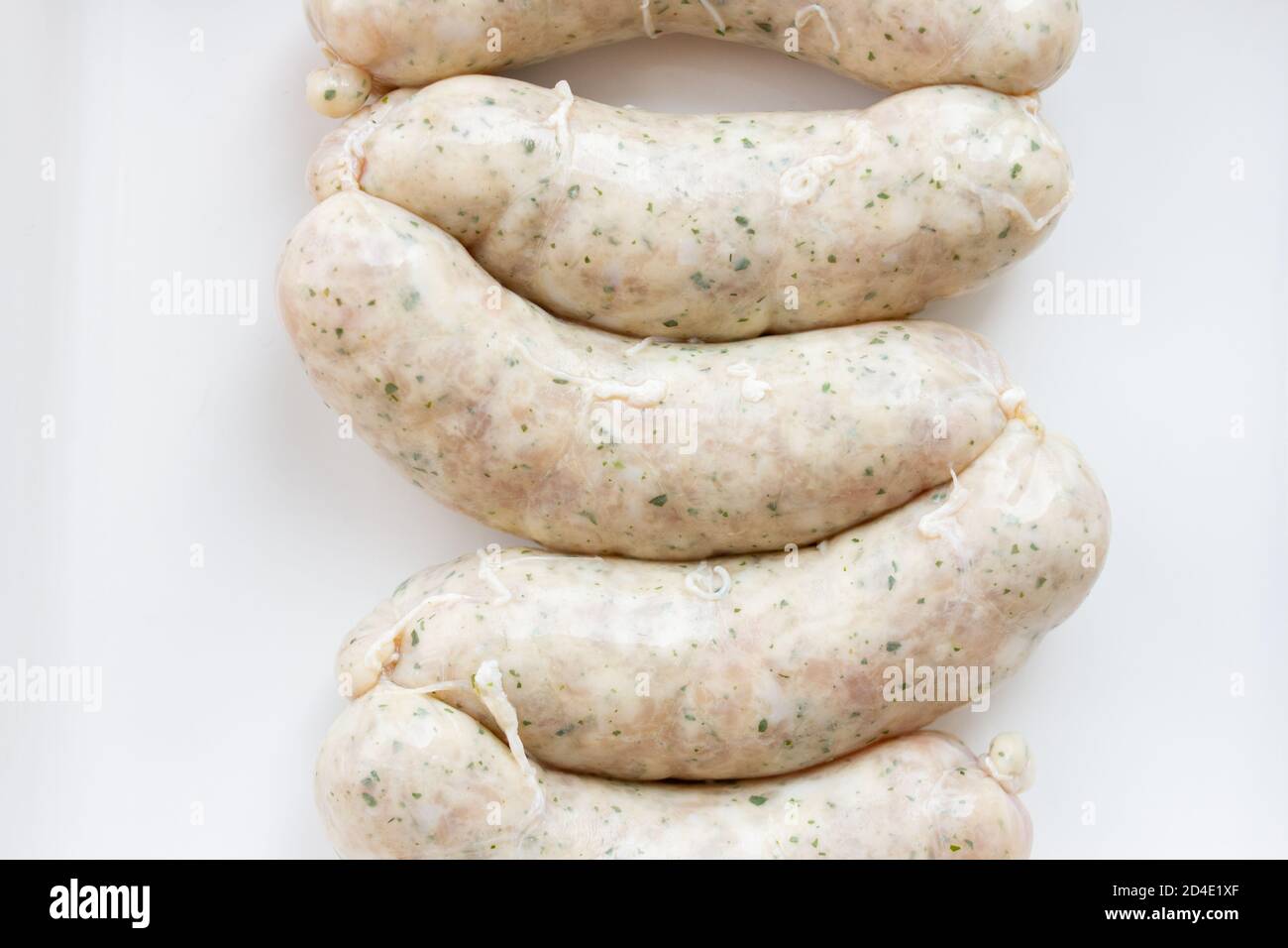 Freshly made raw butchers sausages in skins. Oktoberfest Sausages Stock
