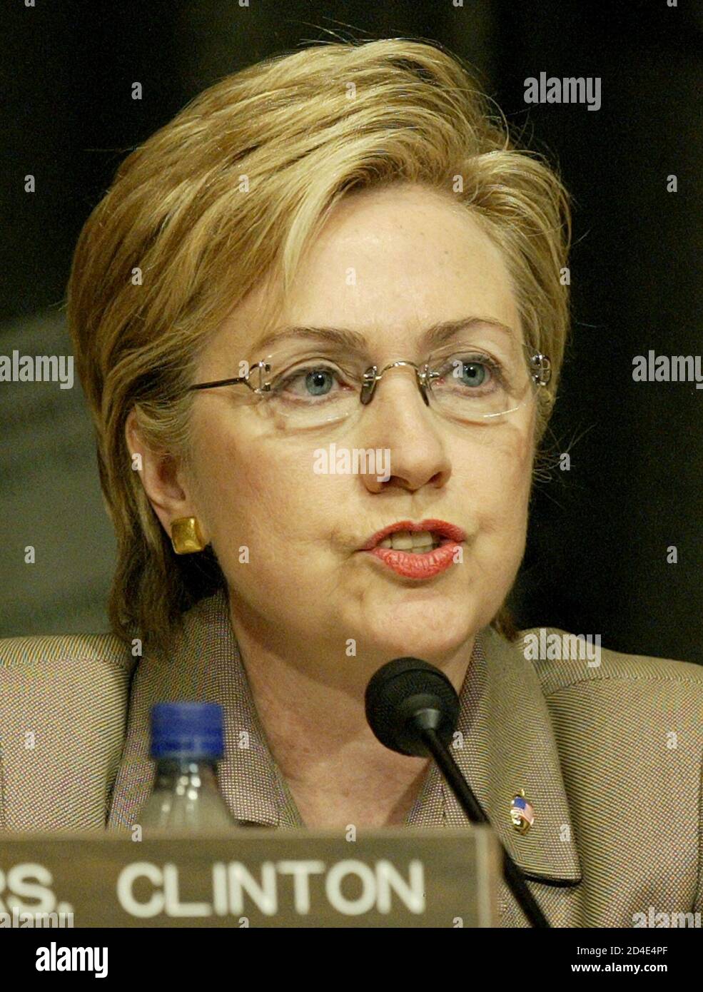 Senator Hillary Rodham Clinton (D-MA) questions U.S. Secretary of Defense Donald Rumsfeld during his testimony on Iraq prison abuse before the Senate Armed Services Committee on Capitol Hill in Washington, May 7, 2004. Rumsfeld, under pressure to resign, warned that many more pictures showing cruel acts by U.S. personnel would follow those that have shocked the world, eroded Iraqi trust and further savaged the image of the United States in the Arab world. REUTERS/Molly Riley  MMR/JDP Stock Photo