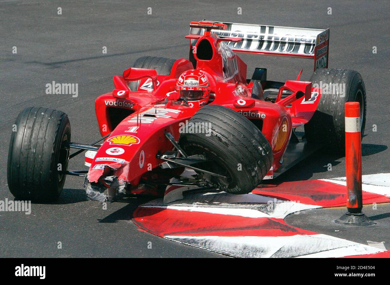 FERRARI FORMULA ONE DRIVER SCHUMACHER RETURNS TO PITS AFTER HE CRASHED HIS  CAR DURING THE MONACO GRAND PRIX. Germany's Formula One driver Michael  Schumacher returns to the pits after he crashed his