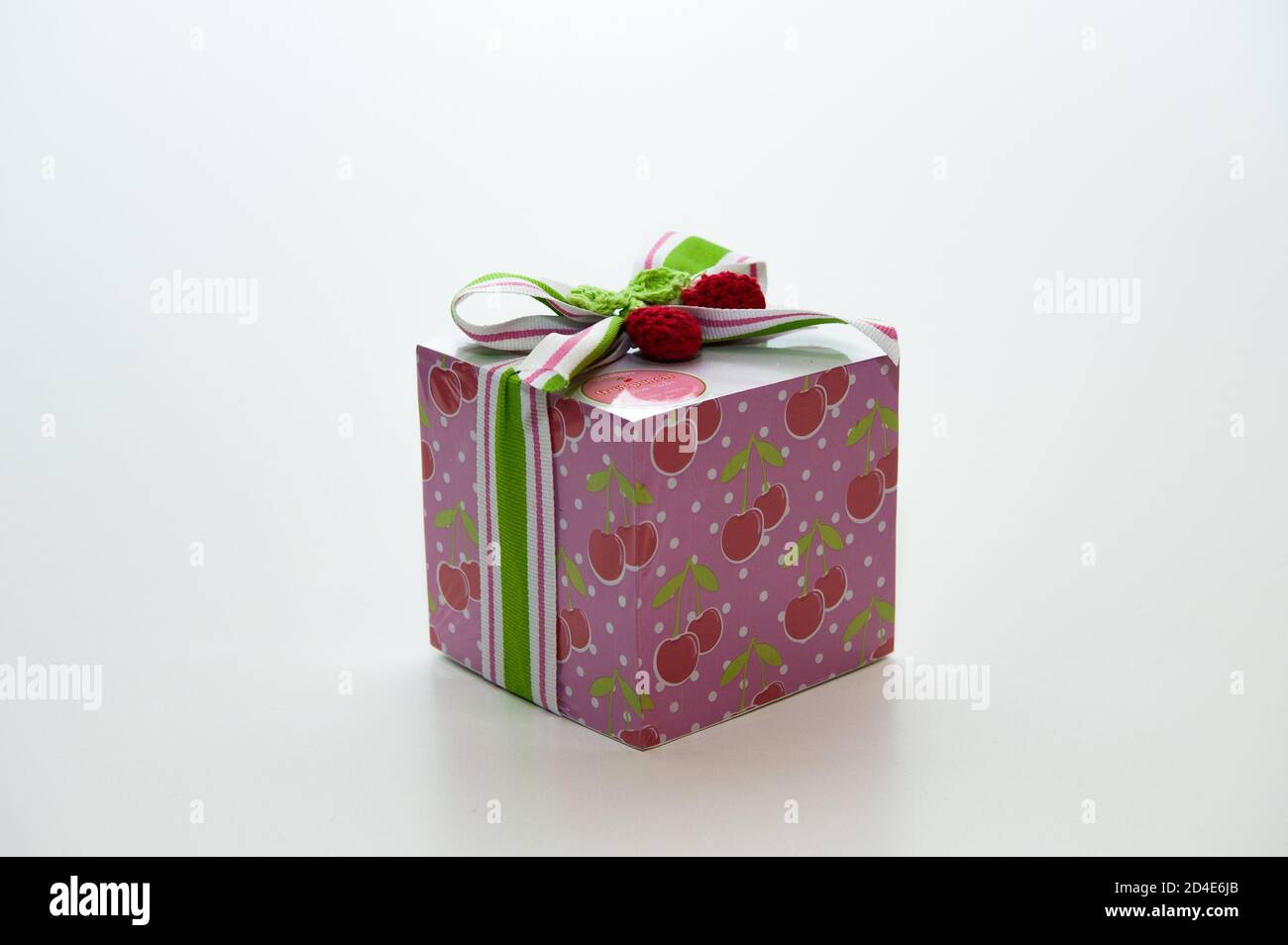 Gift box wrapped with ribbon Stock Photo