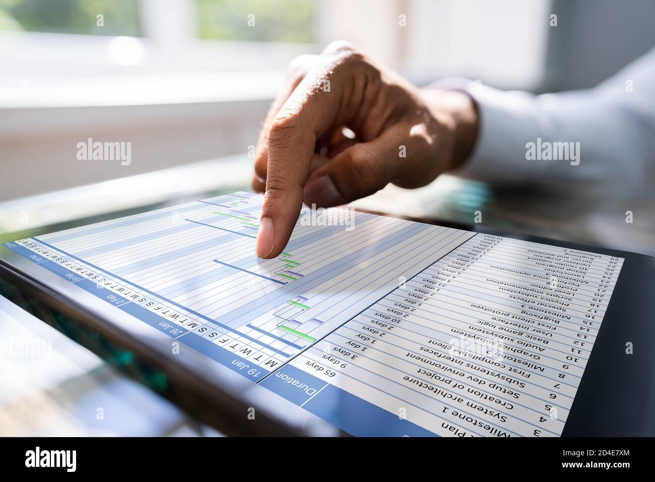 Gantt Chart On Tablet Computer. Diary Agenda Planner Stock Photo
