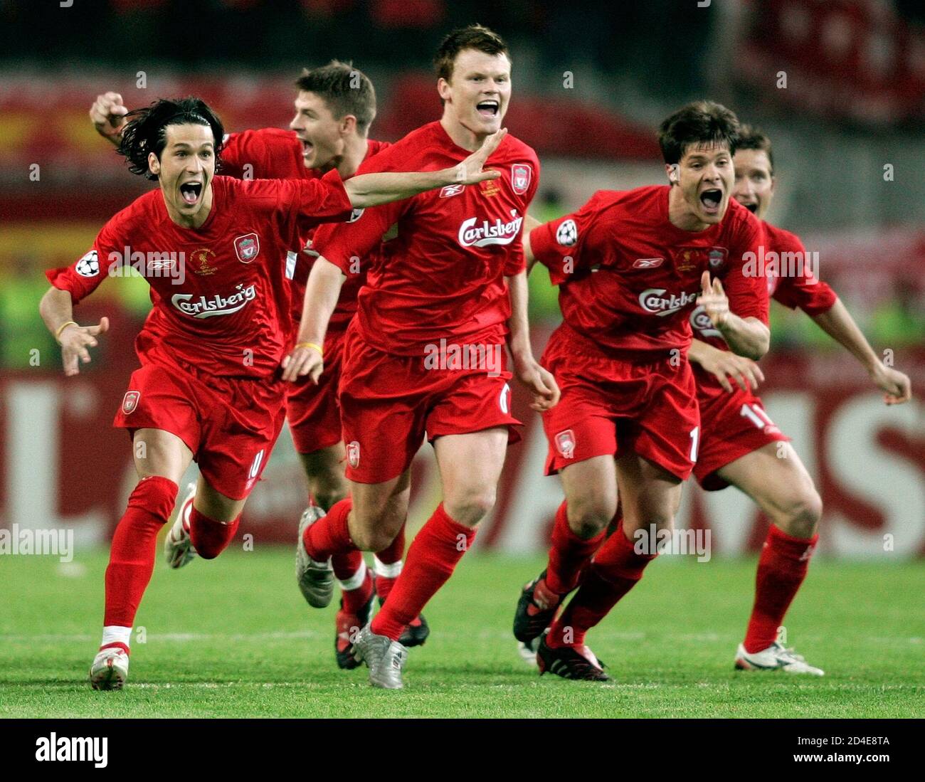 Liverpool S Team Runs On The Pitch To Celebrate Victory Over Ac Milan After Winning The Champions League Final In Istanbul Liverpool S Team L R Luis Garcia Steven Gerrard John Arne Riise Xabi Alonso