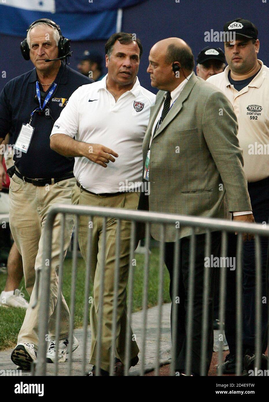 Head Coach Of The Us Soccer Team Arena Is Escorted Off The Field During 2005 Concacaf Gold Cup Semifinal Match Against Honduras In New Jersey Bruce Arena C Head Coach Of The