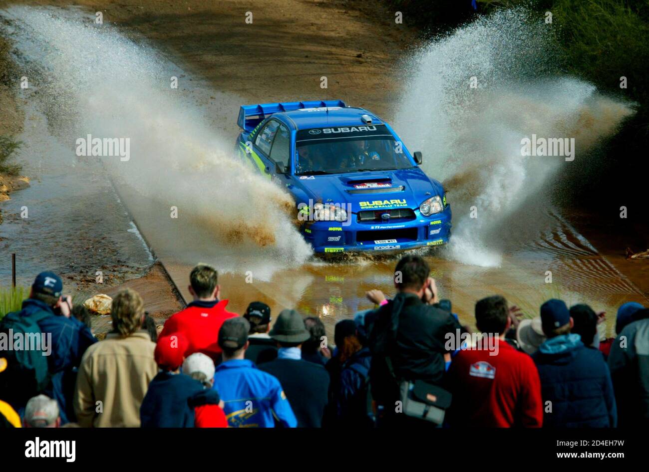 Norway's Petter Solberg in action on stage 21 of the Rally of Australia in Perth, Western Australia September 7, 2003. Solberg finished first ahead of France's Sebastien Loeb and Great Britain's Richard Burns in second and third position respectively. REUTERS/Mal Fairclough  MF/TW Stock Photo