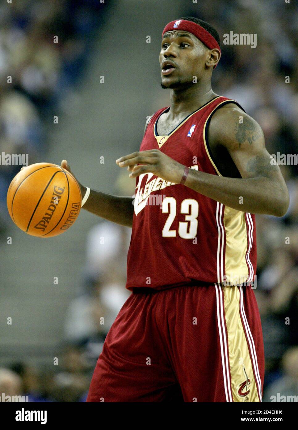 Cleveland Cavaliers' LeBron James (23) makes his NBA debut against he  Sacramento Kings in Sacramento, California October 29, 2003. The  18-year-old 6-foot-8 James, first pick in the 2003 NBA draft, made his
