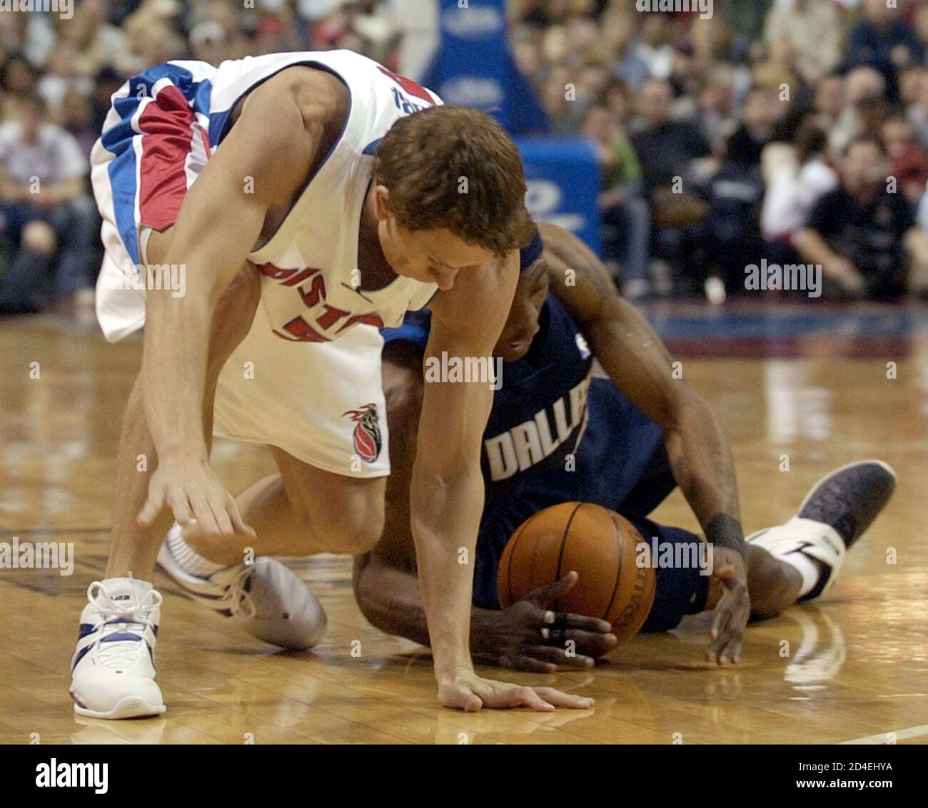 Dallas Mavericks guard Marquis Daniels (6) defends against Atlanta Hawks  forward Antoine Walker (8) during NBA action in Atlanta, Georgia December  22, 2004. The Hawks defeated the Mavericks, 113-100. REUTERS/Tami Chappell  REUTERS