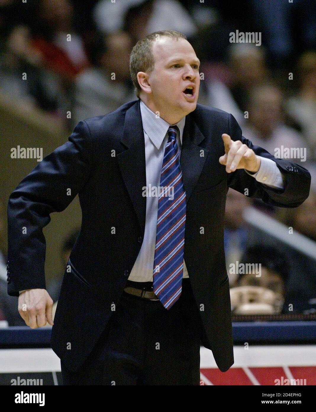 New Jersey Nets coach Lawrence Frank directs his team during their match against the Indiana Pacers in the fourth quarter of their NBA game in East Rutherford, New Jersey, March 22, 2005. The Nets won 98-91.REUTERS/Ray Stubblebine  RFS/DH Stock Photo
