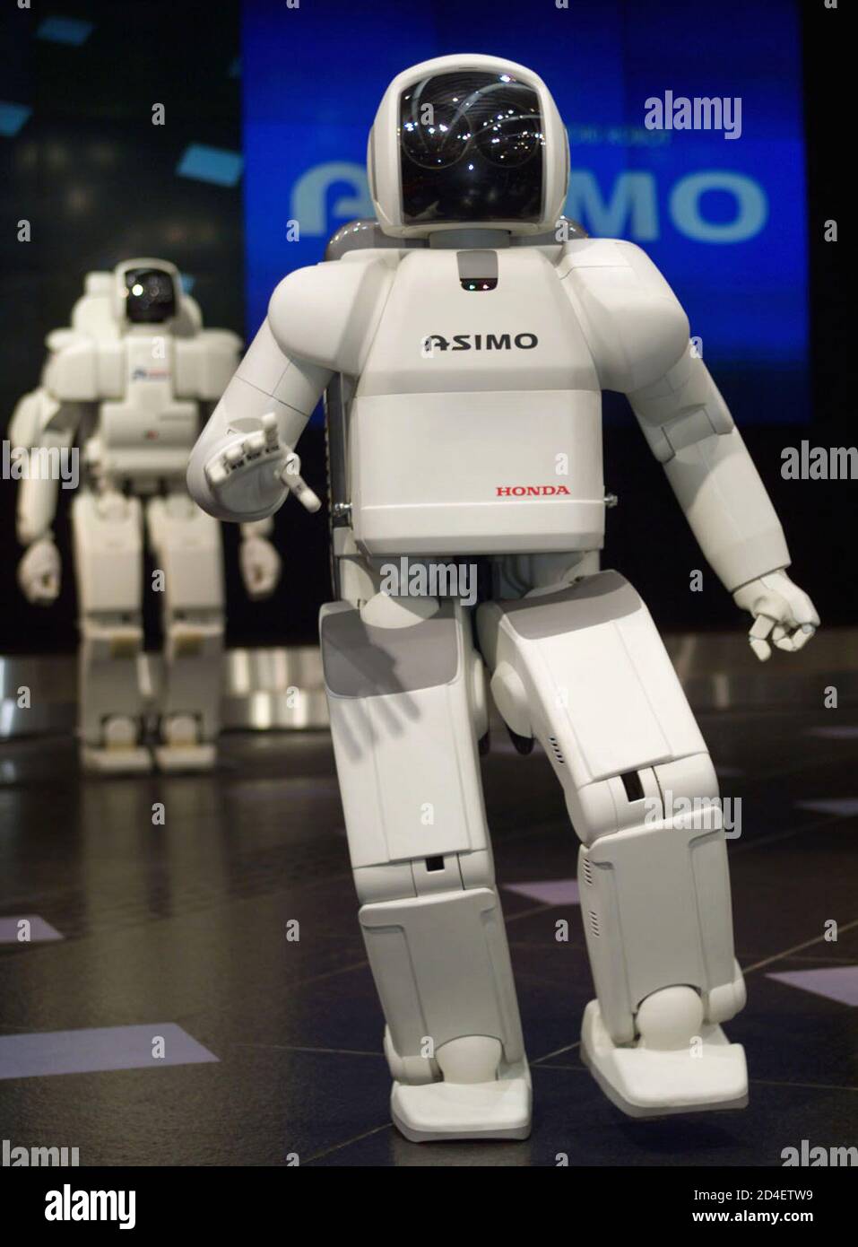 Honda Motor's new humanoid robot ASIMO, with a human-like ability to walk  and dance, is unveiled at Honda headquarters in Tokyo November 20, 2000.  ASIMO, standing for Advance Step in Innovative Mobility,