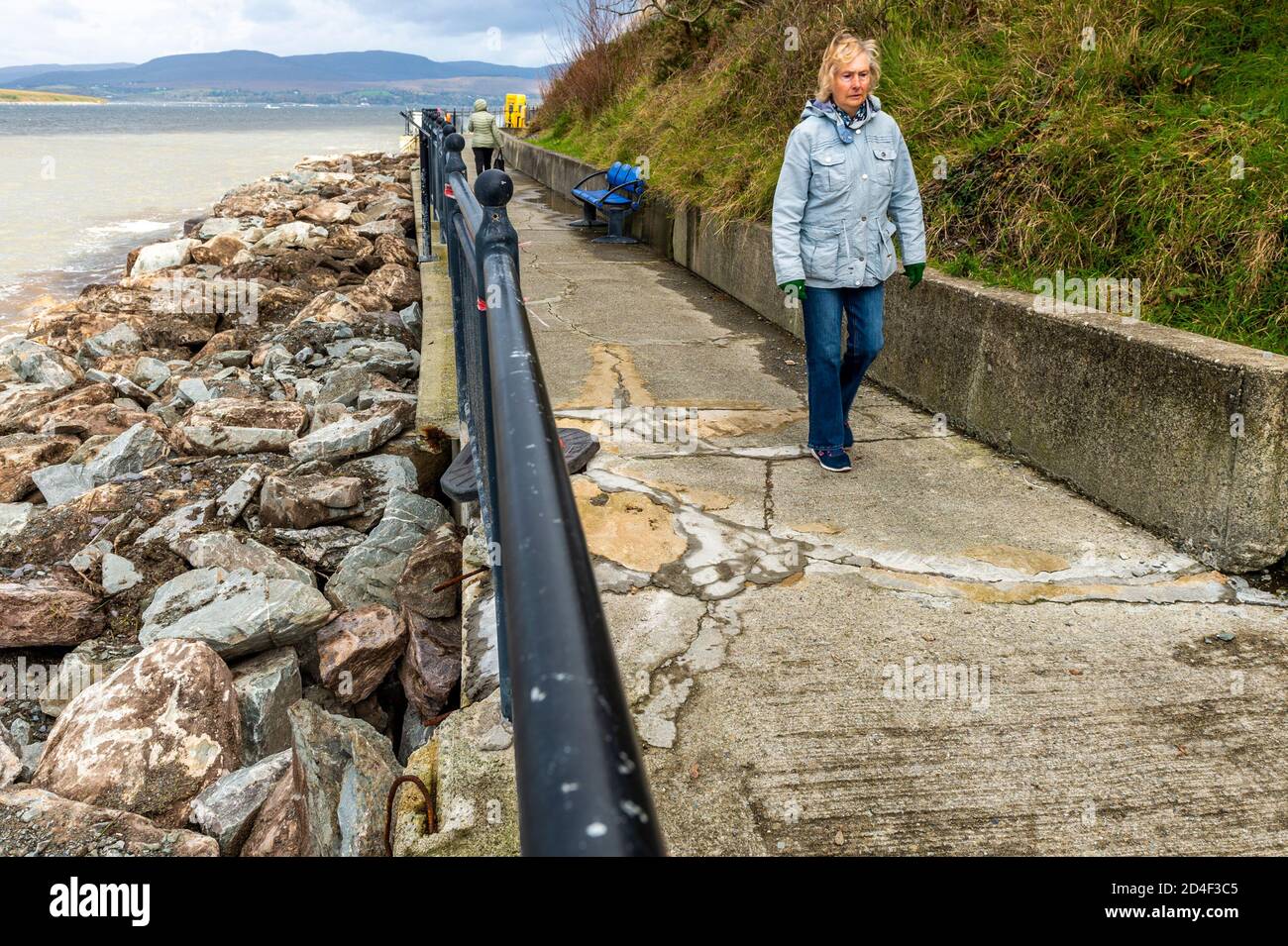Bantry, West Cork, Ireland. 9th Oct, 2020. Cork County Council has signed off on repairs to the sea wall on the Beicin Walkway in Bantry after parts of the wall started to crumble away in the recent bad weather. Tracked diggers are placing heavy rocks on the beach in an attempt to prevent further corrosion to the popular walkway. Credit: AG News/Alamy Live News Stock Photo
