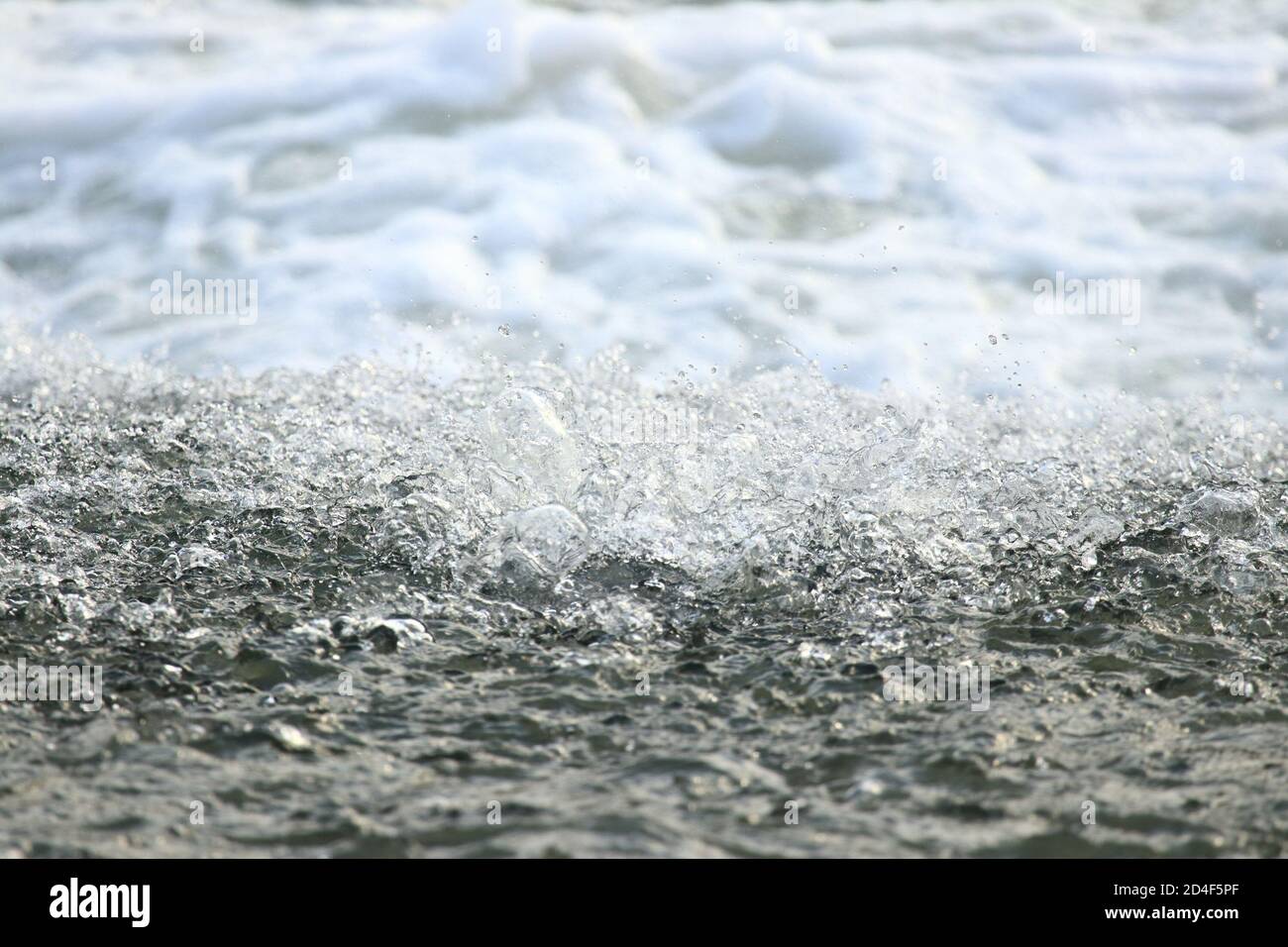 Water splash in river rapids Stock Photo
