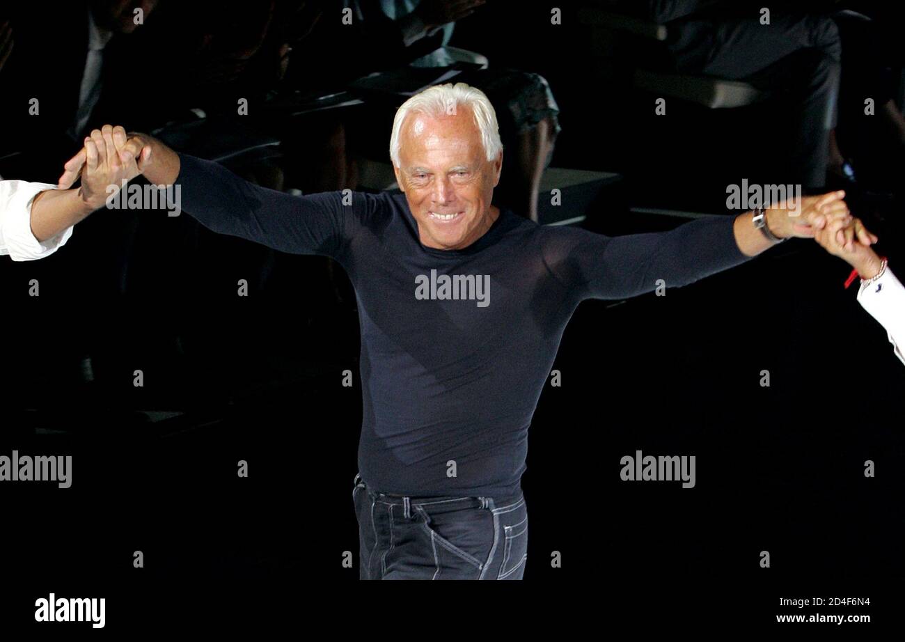 Italian designer Giorgio Armani acknowledges the applause at the end of Emporio  Armani Spring/Summer 2005 women's collection during Milan fashion week  September 27, 2004 Stock Photo - Alamy