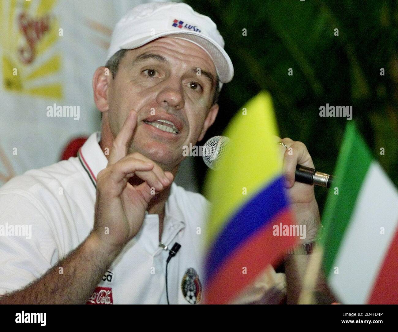 Head coach of the Mexican national soccer team, Javier Aguirre, answers a question during a press conference given at the Campestre Club in Cali where the team is staying during the Copa America, July 14, 2001. Mexico upset Brazil in their first match of the tournament and plays Paraguay on July 15. RR/SV Stock Photo