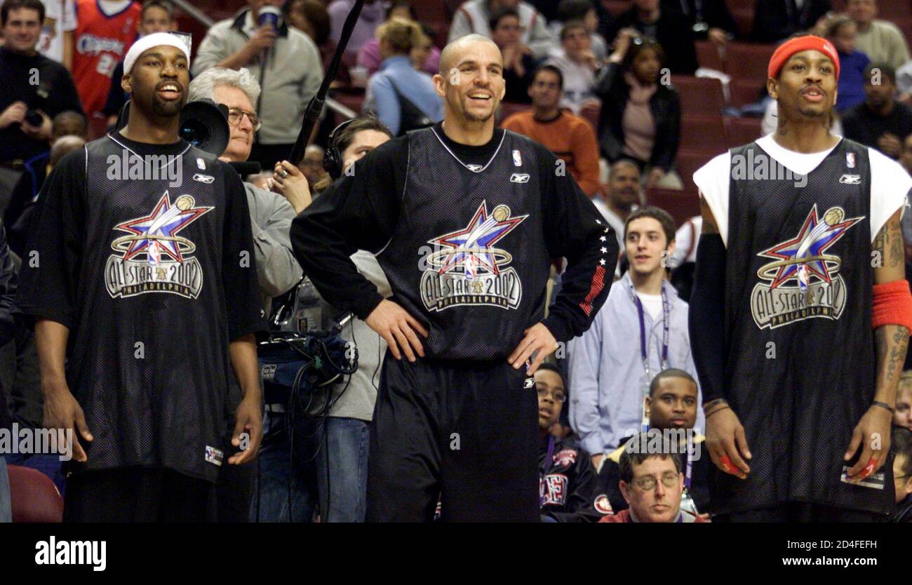 New Jersey Nets Jason Kidd (C) stands with Philadelphia 76ers Allen Iverson  (R) and Charlotte Hornets Baron Davis during the Eastern Conference All-Star  practice at the First Union Center in Philadelphia, February