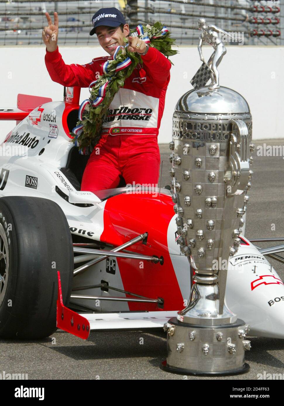 Penske Driver Helio Castroneves Of Brazil Sits In His Car With The Borg Warner Trophy At The Indianapolis Motor Speedway May 27 02 Castroneves Won The Second Of His Back To Back Penske Driver Helio Castroneves Of Brazil Sits In His Car With The Borg Warner Trophy At The Indianapolis Motor Speedway May 27 02 Castroneves Won The Second Of His Back To Back
