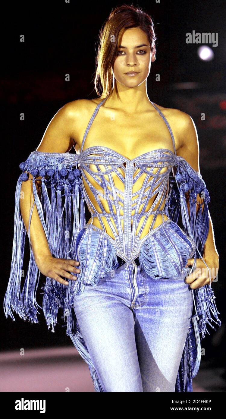 A model wears one of French fashion designer Jean-Paul Gaultier's creations  during one of a series of catwalk shows in London's Victoria and Albert  Museum, May 30, 2003. The fashion walks are
