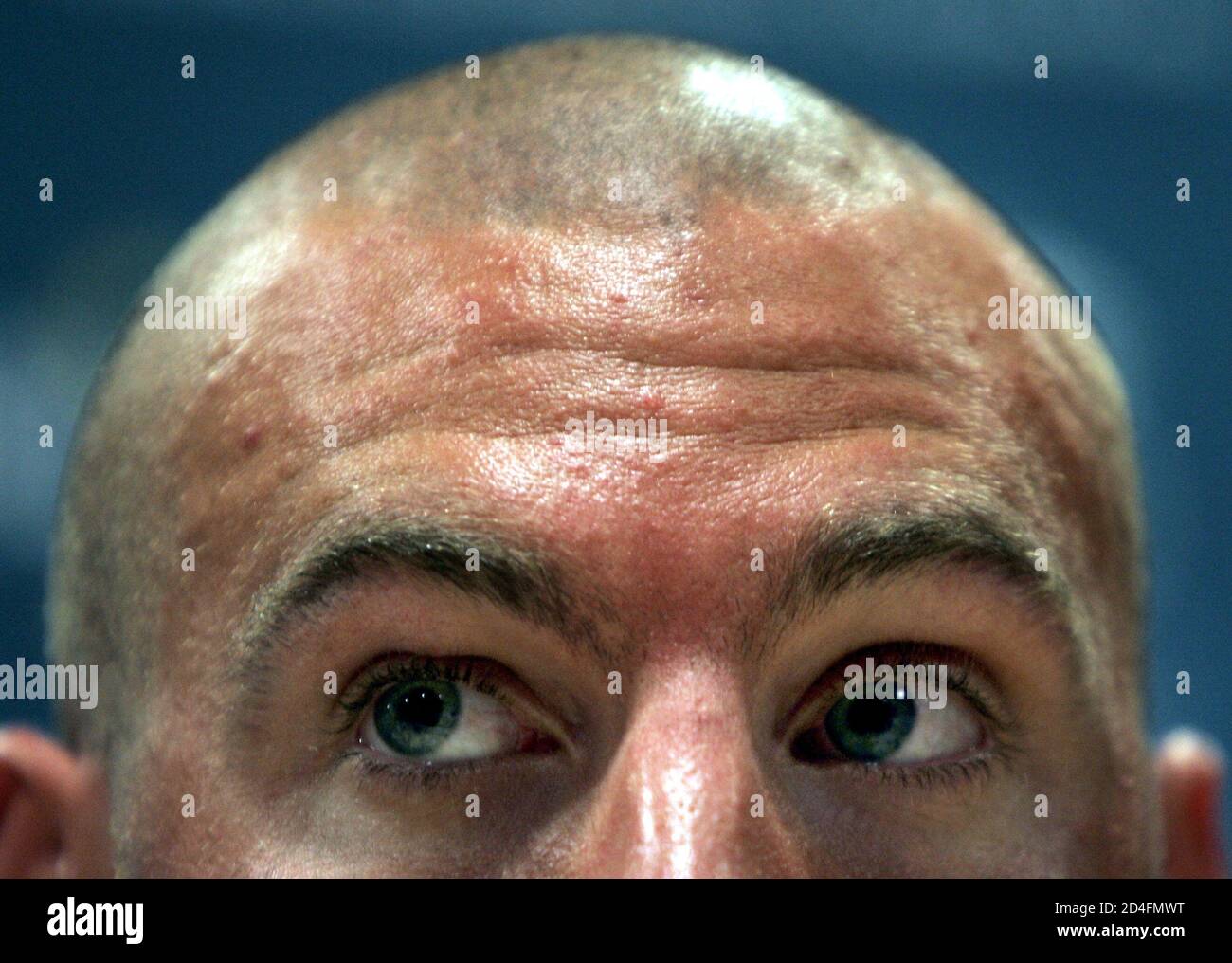 Australian long distance swimmer Grant Hackett sports a new cropped hairstyle as he appears at news conference of the Australian Olympic swimming team in Athens, August 10, 2004. Hackett, a 2000 Olympics Australian long distance swimmer Grant Hackett sports a new cropped hairstyle as he appears at news conference of the Australian Olympic swimming team in Athens, August 10, 2004. Hackett, a 2000 Olympics