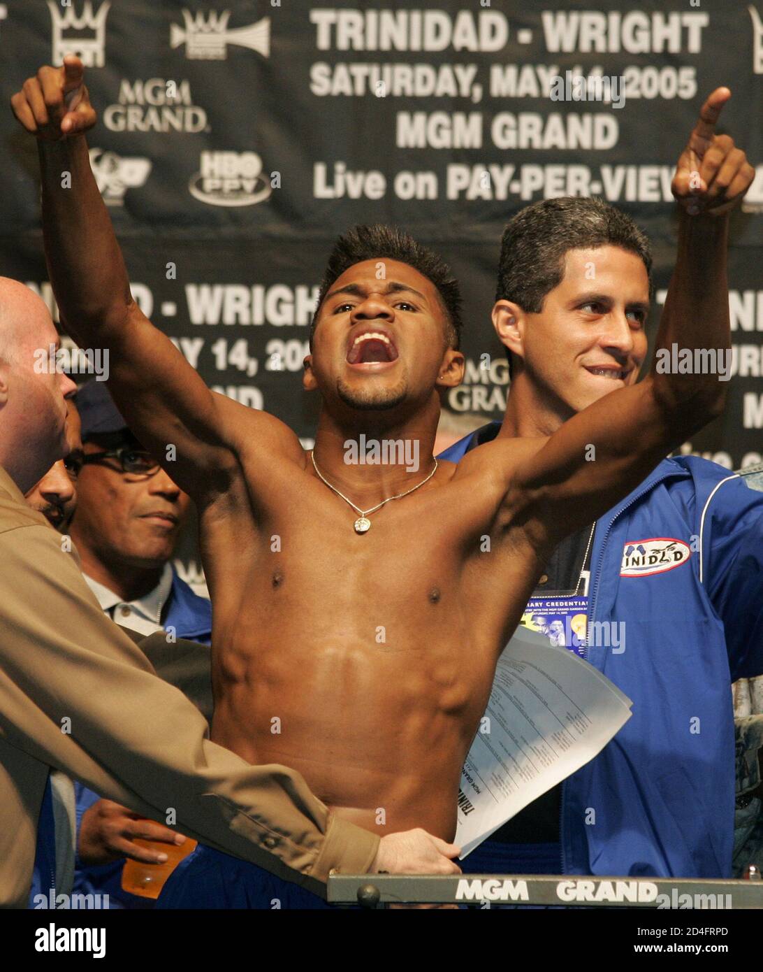 Middleweight boxer Felix "Tito" Trinidad of Cupey Alto, Puerto Rico yells to fans during an official weigh-in at the MGM Grand Garden Arena in Las Vegas, Nevada May 13, 2005. Trinidad (42-1) takes on Winky Wright (48-3) of St. Petersburg, Florida in a 12-round WBC championship elimination bout at the arena May 14. Both fighters weighed the 160 pound limit. REUTERS/Steve Marcus  SM/SV Stock Photo