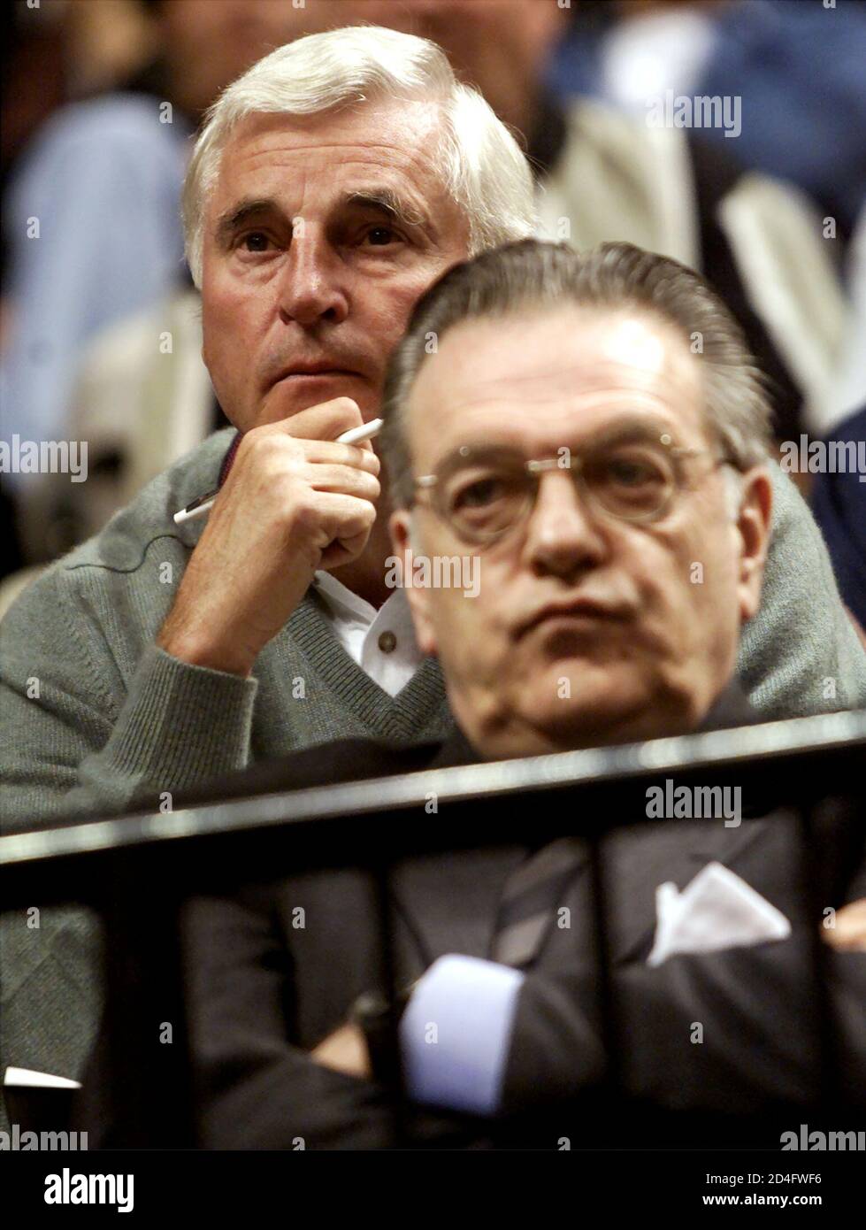 Former Indiana University men's basketball coach Bob Knight (L) watches the  Indiana Pacers play the Milwaukee Bucks, November 8, 2000 at the Conseco  Fieldhouse in Indianapolis, Indiana. Knight attended Pacers' practice  November