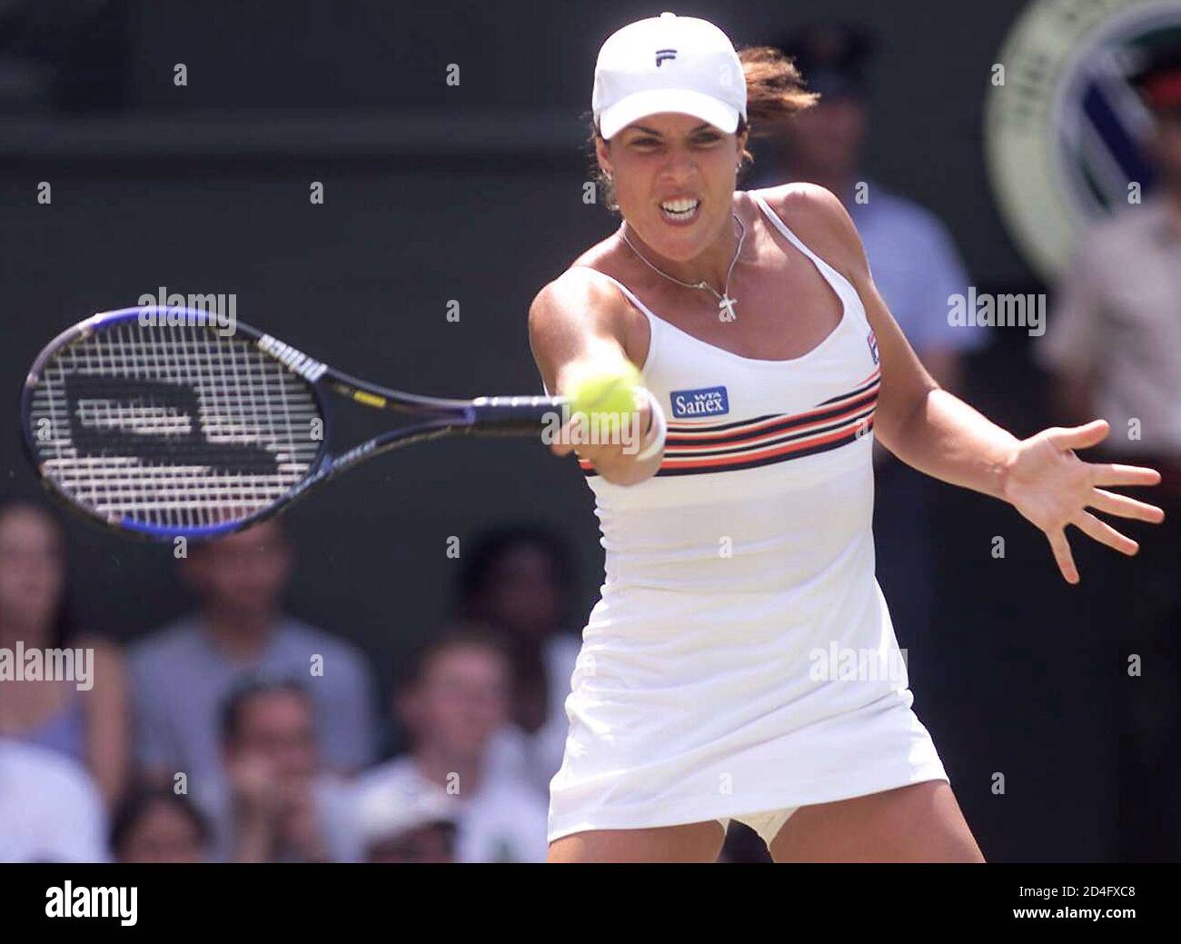 Jennifer Capriati of the U.S. plays a return to compatriot Serena Williams  during their women's quarter finals match at the Wimbledon Championships  July 3, 2001. PS/GB Stock Photo - Alamy