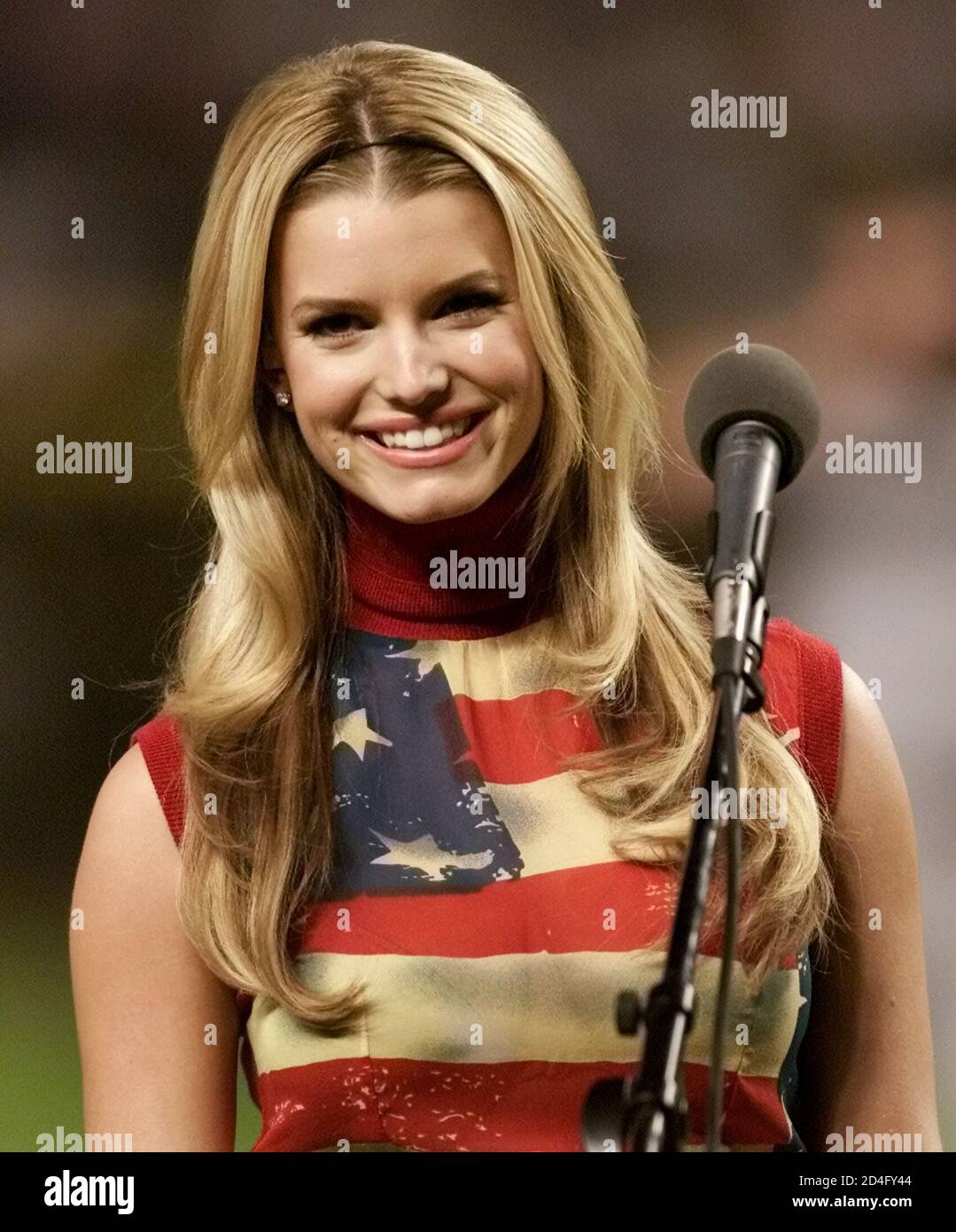Pop Star Jessica Simpson Smiles After Singing God Bless America During The Seven Inning Stretch Of Game 6 Of The 01 World Series Between The New York Yankees And Arizona Diamondbacks At