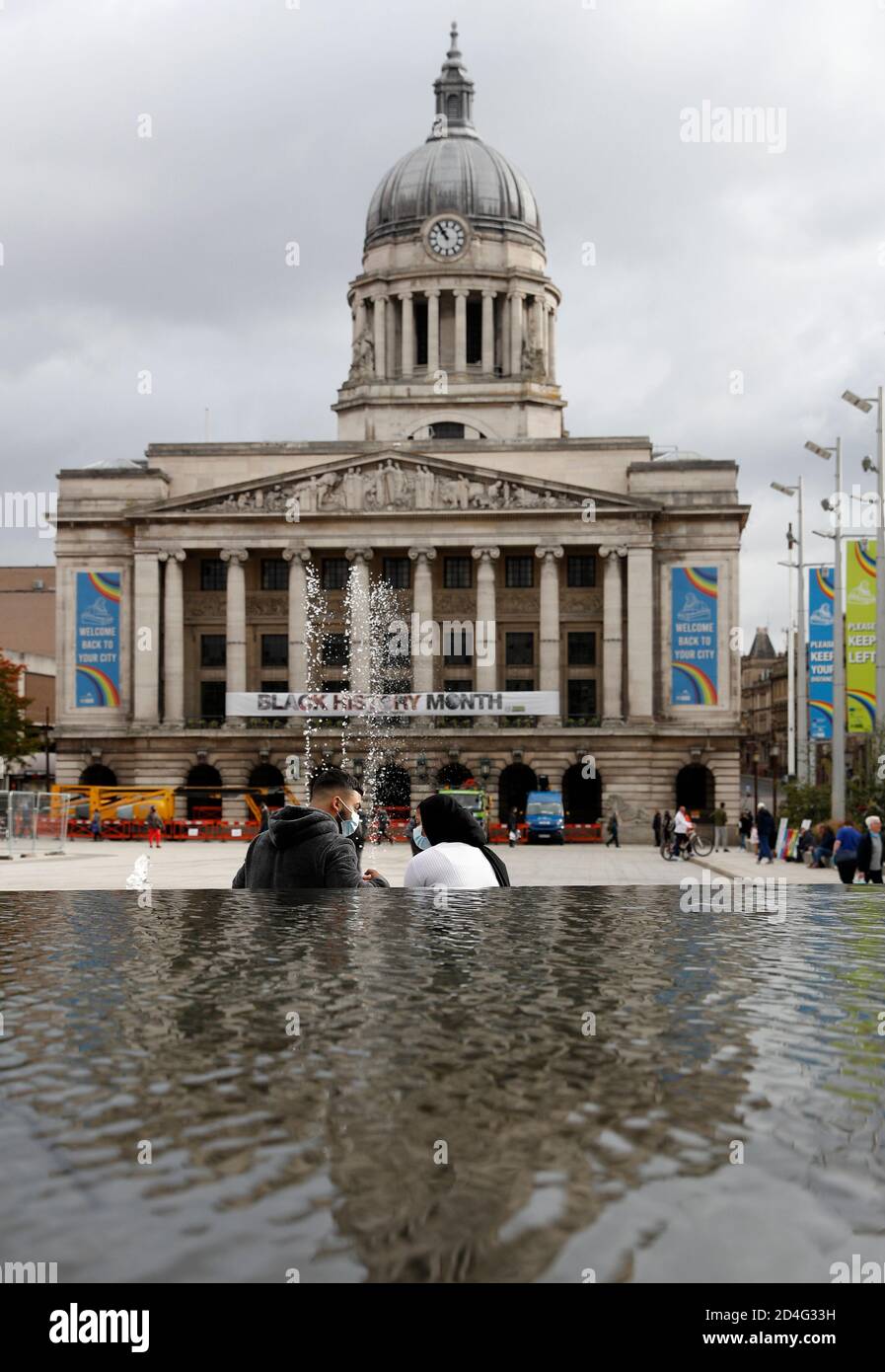 Nottingham, Nottinghamshire, UK. 9th October 2020. People sit in front of the Town Hall after it was announced Nottingham has the highest Covid-19 infection rate in the UK. Credit Darren Staples/Alamy Live News. Stock Photo