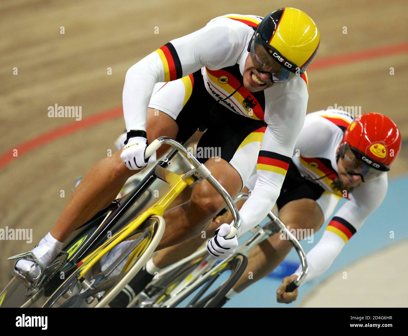 The German team competes in the men's team track cycling sprint final at the Athens 2004 Olympic Summer Games August 21, 2004. [Germany won the race, with Japan taking silver and France winning the bronze medals]. Stock Photo