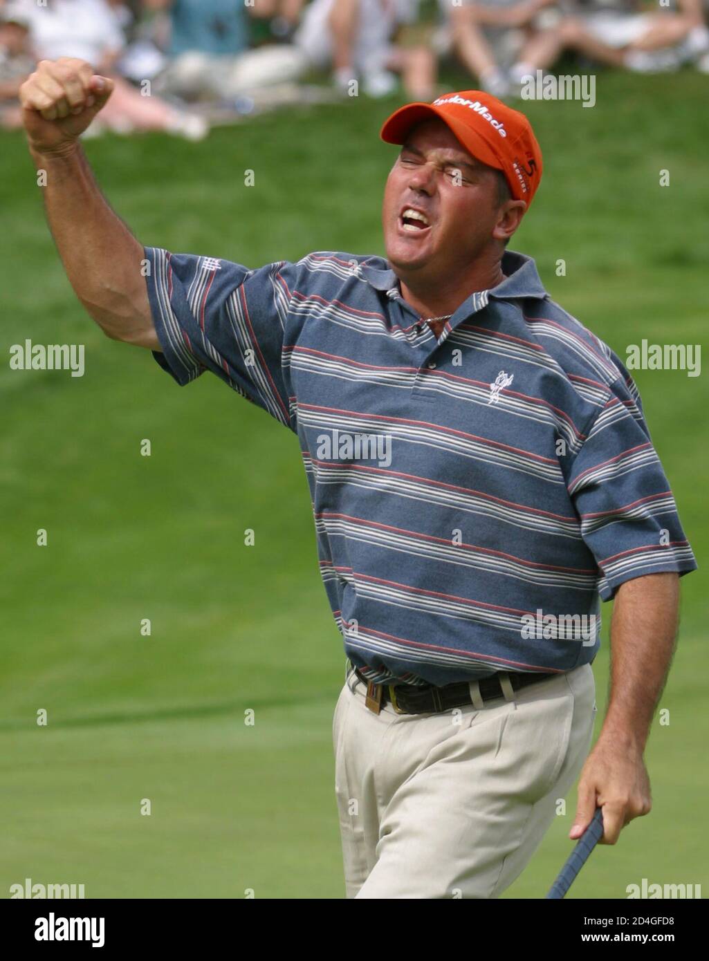 Rich Beem of the United States celebrates his eagle on the 17th hole of the final round of the International in Castle Rock, Colorado August 4, 2002. Beem edged out Steve Lowrey 44-43 in the modified Stableford scoring to win the International. REUTERS/Gary C. Caskey  GCC/SV Stock Photo