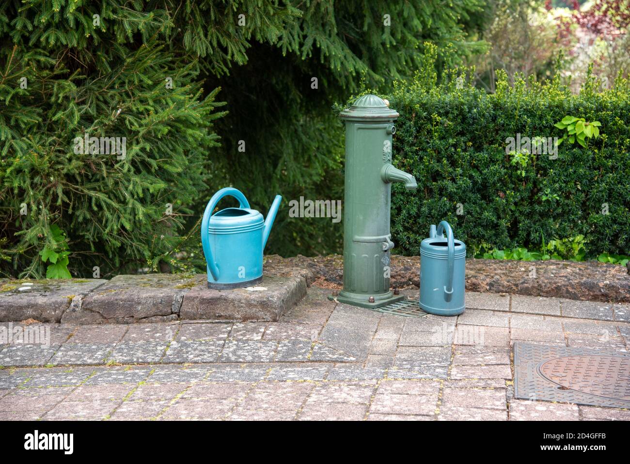 Water tap watering can hires stock photography and images Alamy