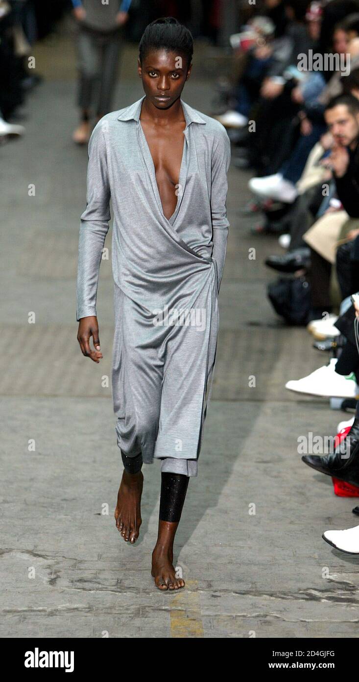 A model presents this creation by designer Haider Ackermann during the  presentation of his Spring-Summer ready-to-wear women's collection for 2004  in Paris, October 7, 2003. [Ackermann is a French-nationalised Colombian  based in