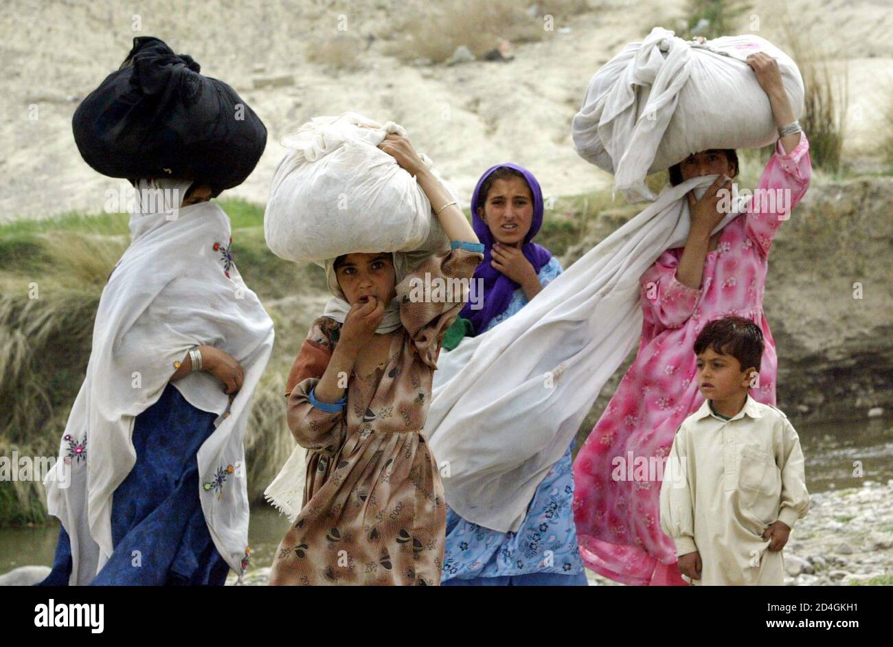 A Tribal Family Flees Their Home As Pakistani Troops Intensify Their Hunt For Islamic Militants In Wana South Waziristan Near The Afghan Border March 04 A Suspected Senior Al Qaeda Member
