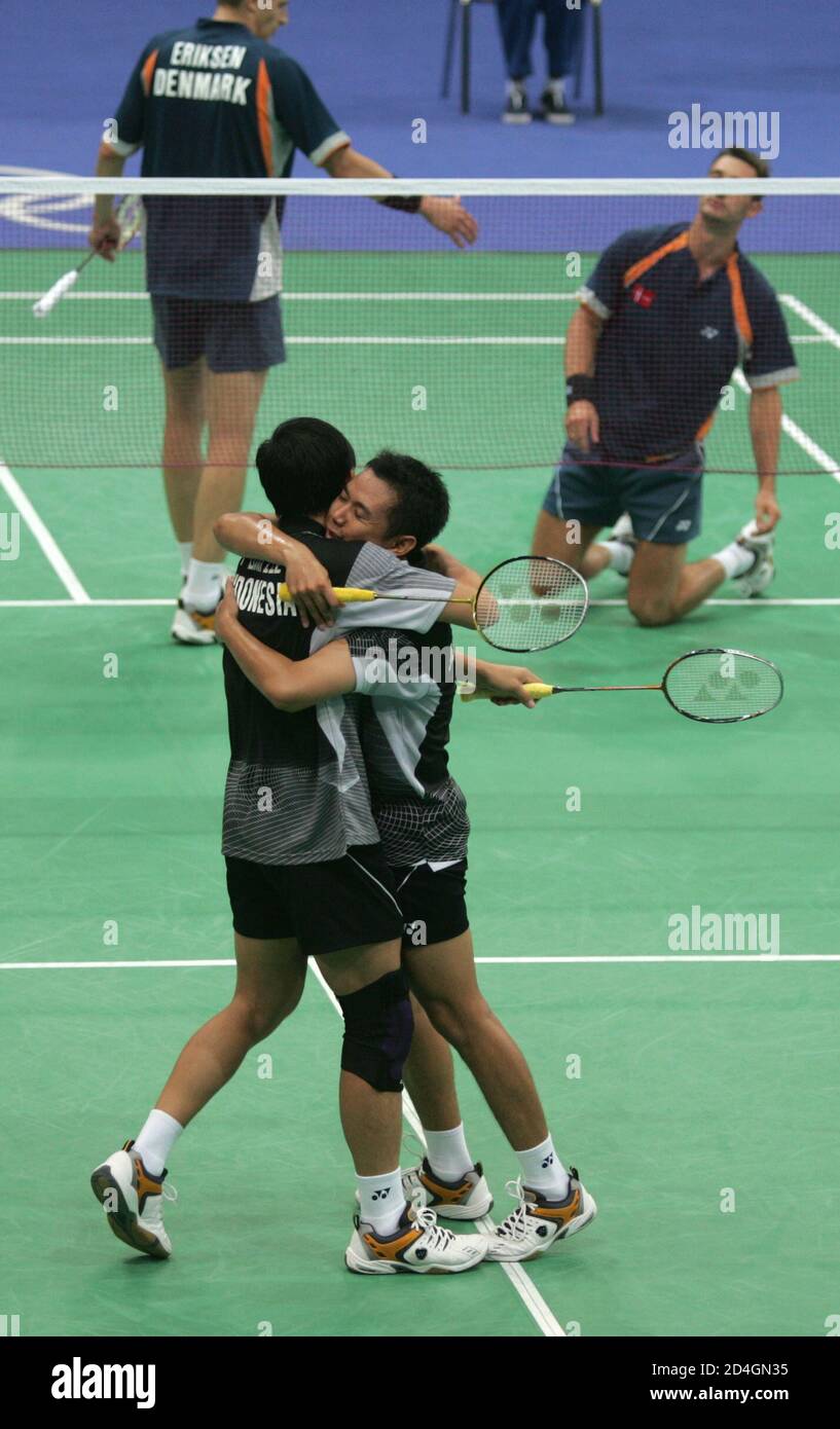 Indonesian Partners Flandy Limpele L And Eng Hian Celebrate Winning The Bronze Medal In The Men S Doubles Badminton Match At The Athens 2004 Olympic Games August 20 2004 They Defeated Denmark S Jens