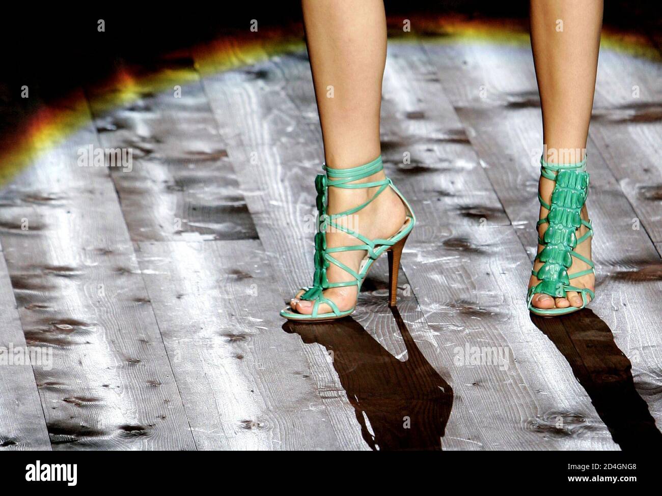 A model presents shoes as part of Roberto Cavalli Spring/Summer 2005  women's collection during Milan fashion week October 2, 2004 Stock Photo -  Alamy