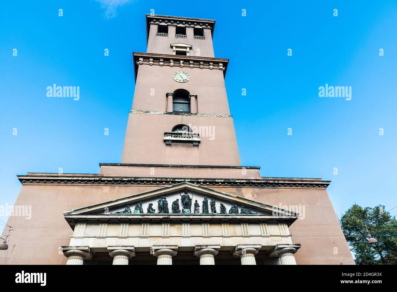 Facade of the The Church of Our Lady (Vor Frue Kirke), the cathedral of Copenhagen, on Frue Plads square in Copenhagen, Denmark Stock Photo