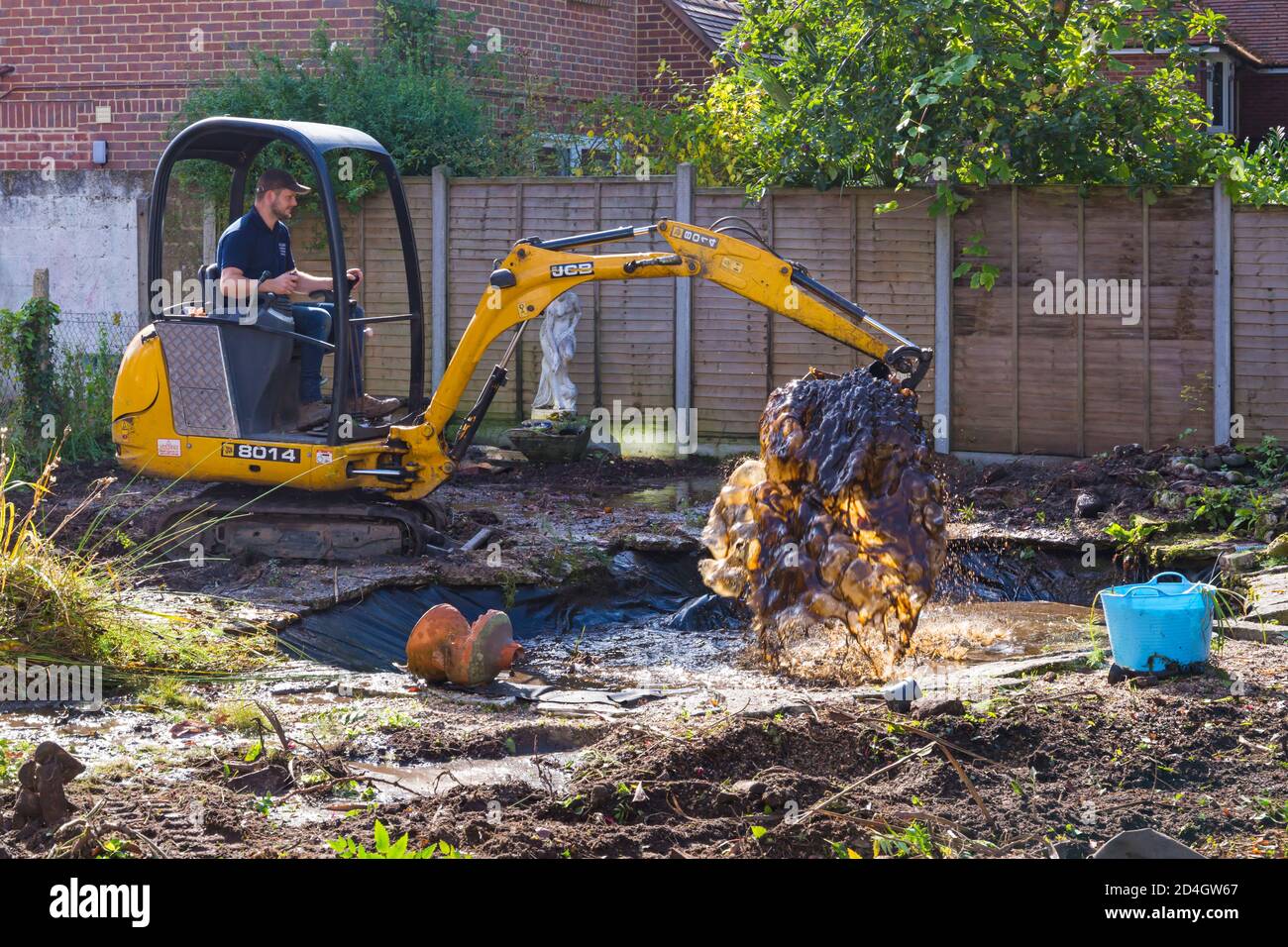 Garden clearance work and renovation taking part in garden at