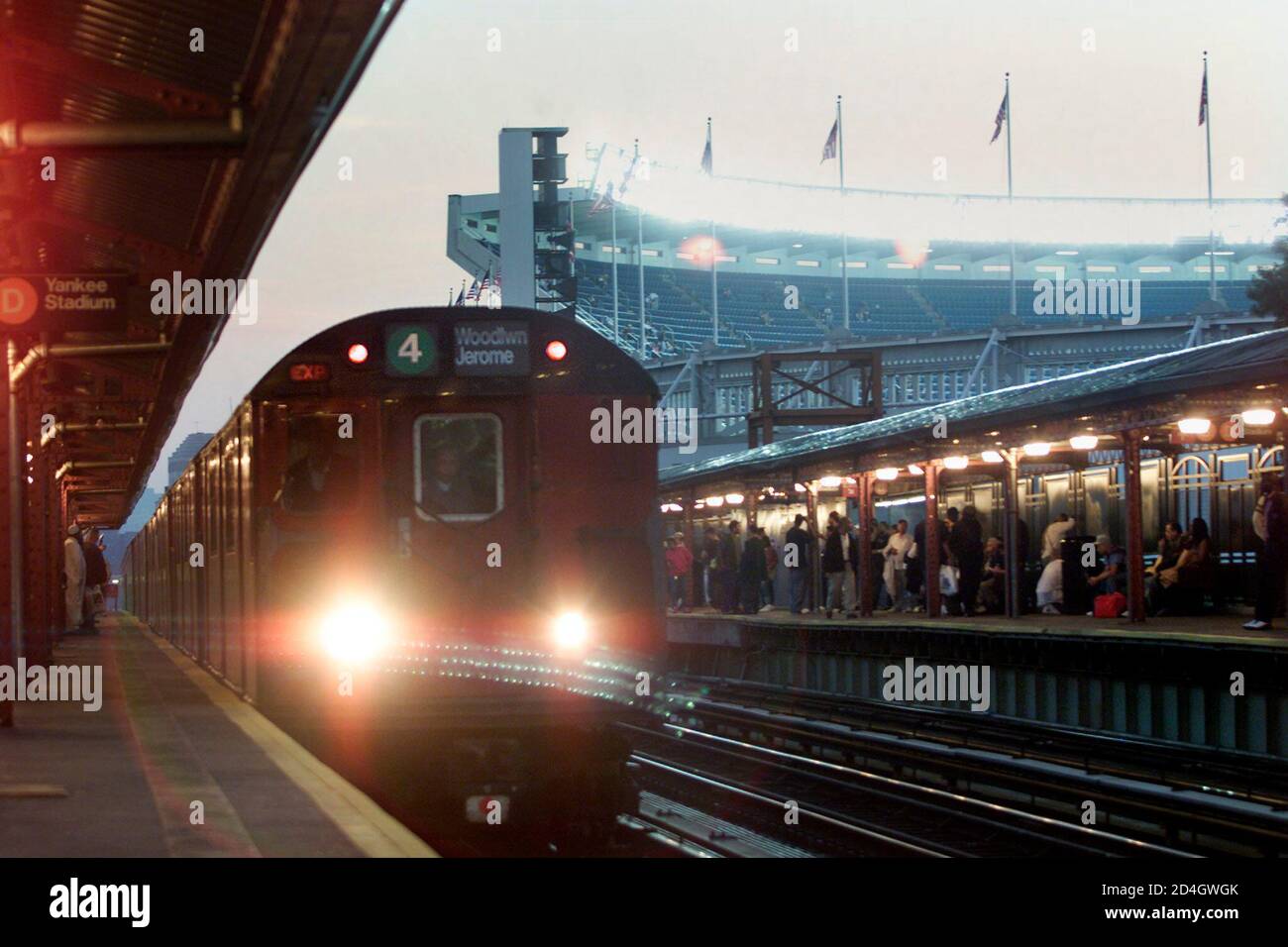 The number four subway train arrives at the 161st street station at
