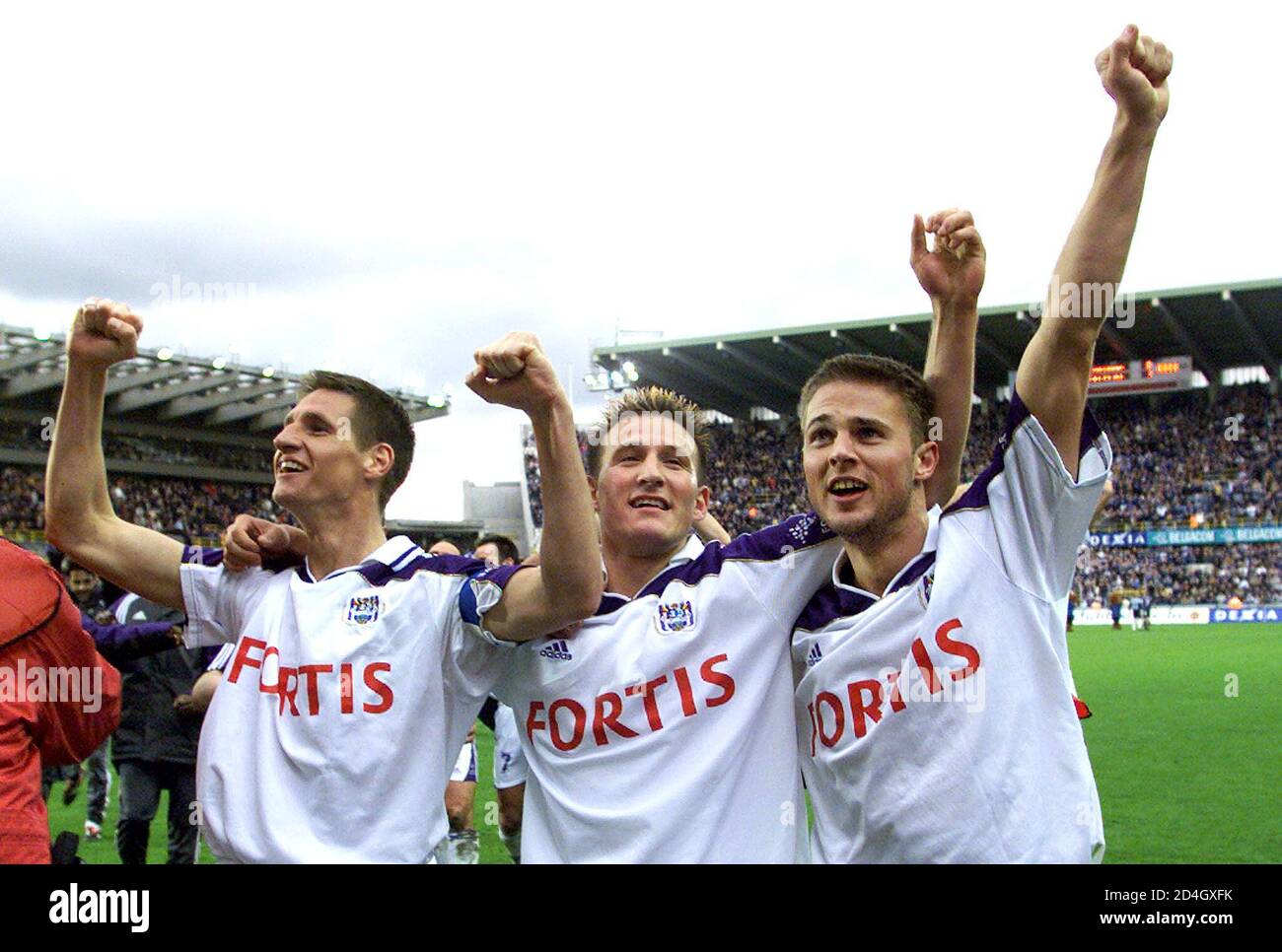 Anderlecht S Players De Boeck Baseggio And Doll Celebrate Victory Agtainst Bruges At The Jan Breydel Stadium In Bruges Anderlecht S Players Glen De Boeck L Walter Baseggio C And Olivier Doll R Celebrate