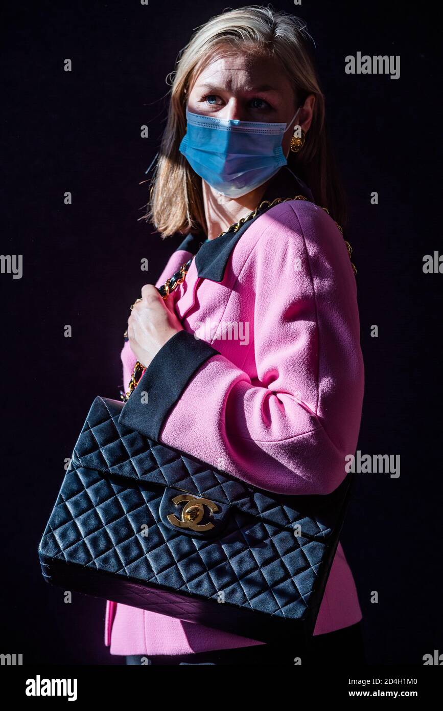 London, UK. 09th Oct, 2020. Black Lambskin Jumbo Single Flap Bag, Chanel, c.  1991-94, est £ 1,600 - 2,200 and Pink and black Crepe Blazer, Chanel, c.  1990, est £ 400 