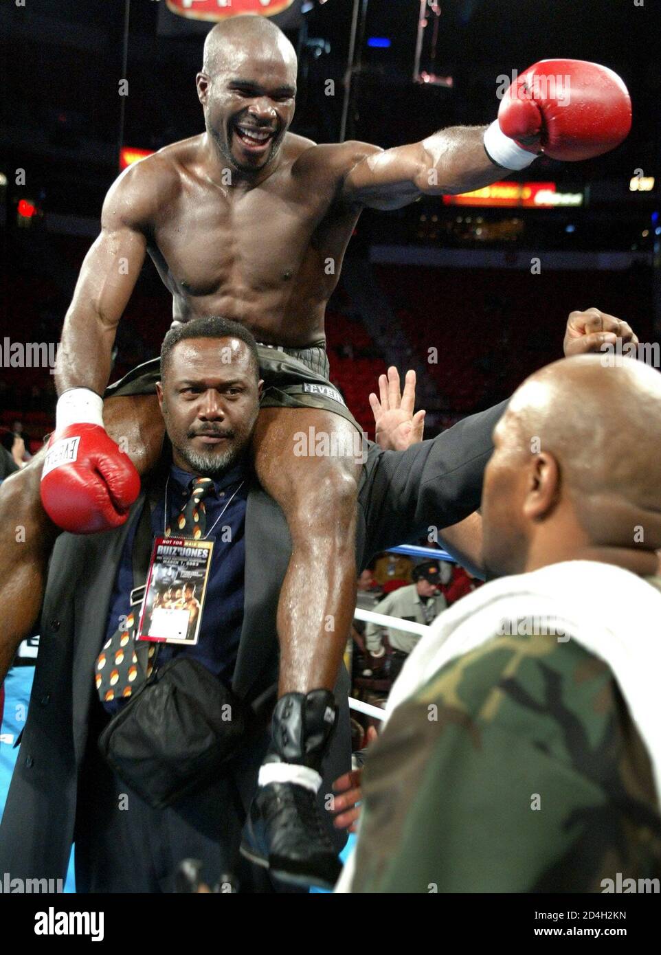 WBA cruiserweight champion Jean-Marc Mormeck, of Noisy LeGrand, France, sits atop his as he celebrates his victory [over Alexander Gurov, of Marioupol, Ukraine], at the Thomas & Mack Center in Las Vegas, Nevada on March 1, 2003. Mormeck retained his title with an eighth round TKO. Stock Photo