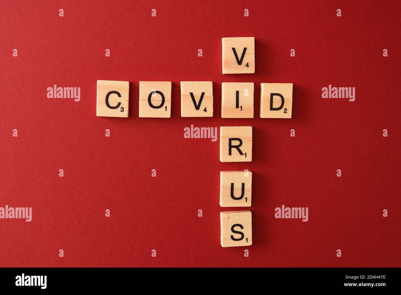 Covid Virus on Wooden tiles Stock Photo