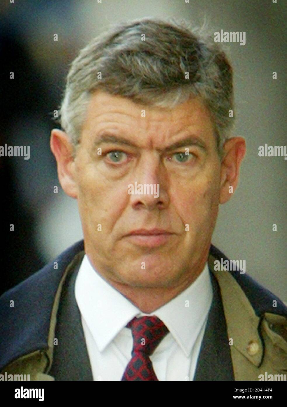 Barrister Richard Latham, leading the prosecution in the Soham murder trial, arrives at the Old Bailey in London, November 4, 2003. Britain's Old Bailey court continued the process on Tuesday of selecting a jury for the trial of former school caretaker Ian Huntley who is charged with the double murder of British schoolgirls Holly Wells and Jessica Chapman in August 2002. REUTERS/Peter Macdiarmid  PKM/ASA/KAF Stock Photo