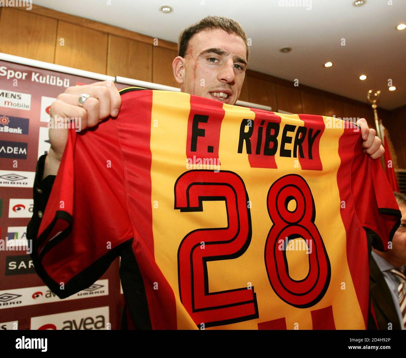 French midfield Franck Ribery, formerly of FC Metz in France, displays his  jersey from his new team Galatasaray in Istanbul, February 1, 2005. Ribery,  22, became the second Frenchman tojoin theTurkish Super