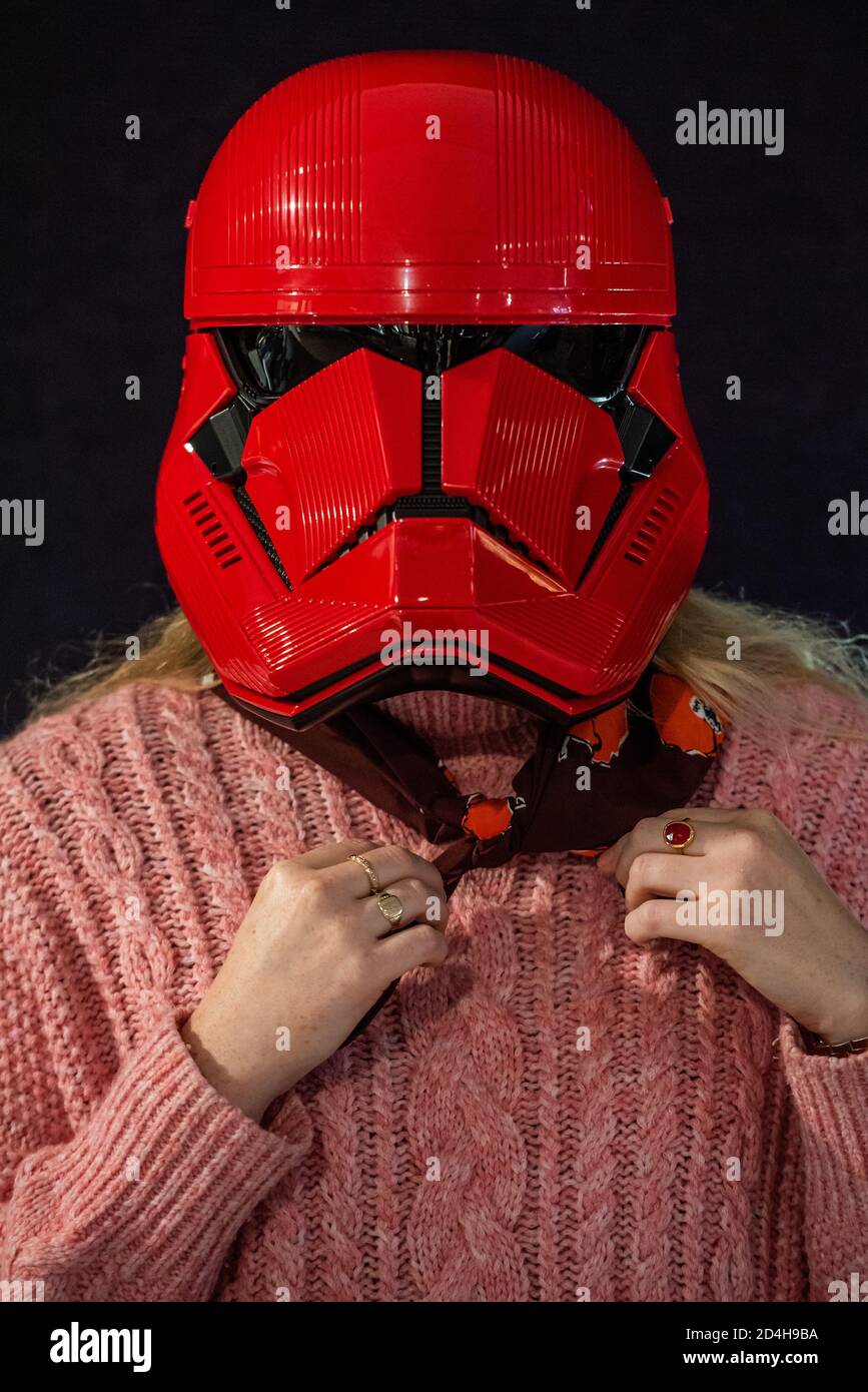 London, UK. 09th Oct, 2020. A screen-used Sith Trooper Helmet from Star Wars: The Rise Of Skywalker (2019), donated to the cause by Lucasfilm. It was created by BAFTA award-winning costume designer Michael Kaplan in a red, distinguishing the new stormtroopers from the classic, white-armoured forces of previous generations, estimate £20,000-30,000 - Preview of Bonhams' Entertainment Memorabilia sale, including a collection to be sold for the benefit of BAFTA, in Knightsbridge. Credit: Guy Bell/Alamy Live News Stock Photo