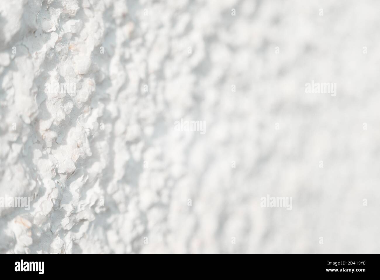 White spanish rough wall facade close-up Stock Photo